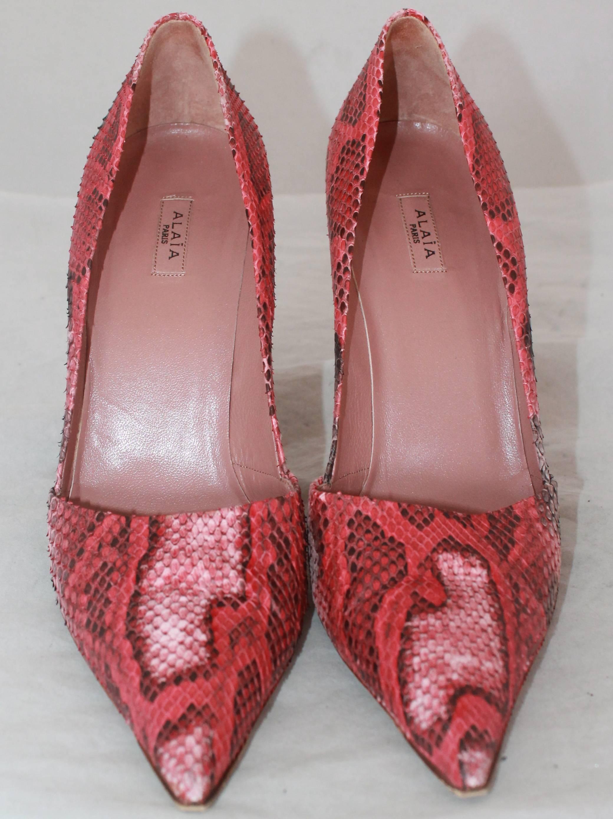 red and black snakeskin heels