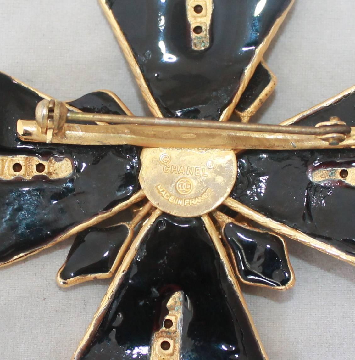 Chanel 1970's Goldtone Black Maltese Cross Brooch with Rhinestones  In Excellent Condition In West Palm Beach, FL