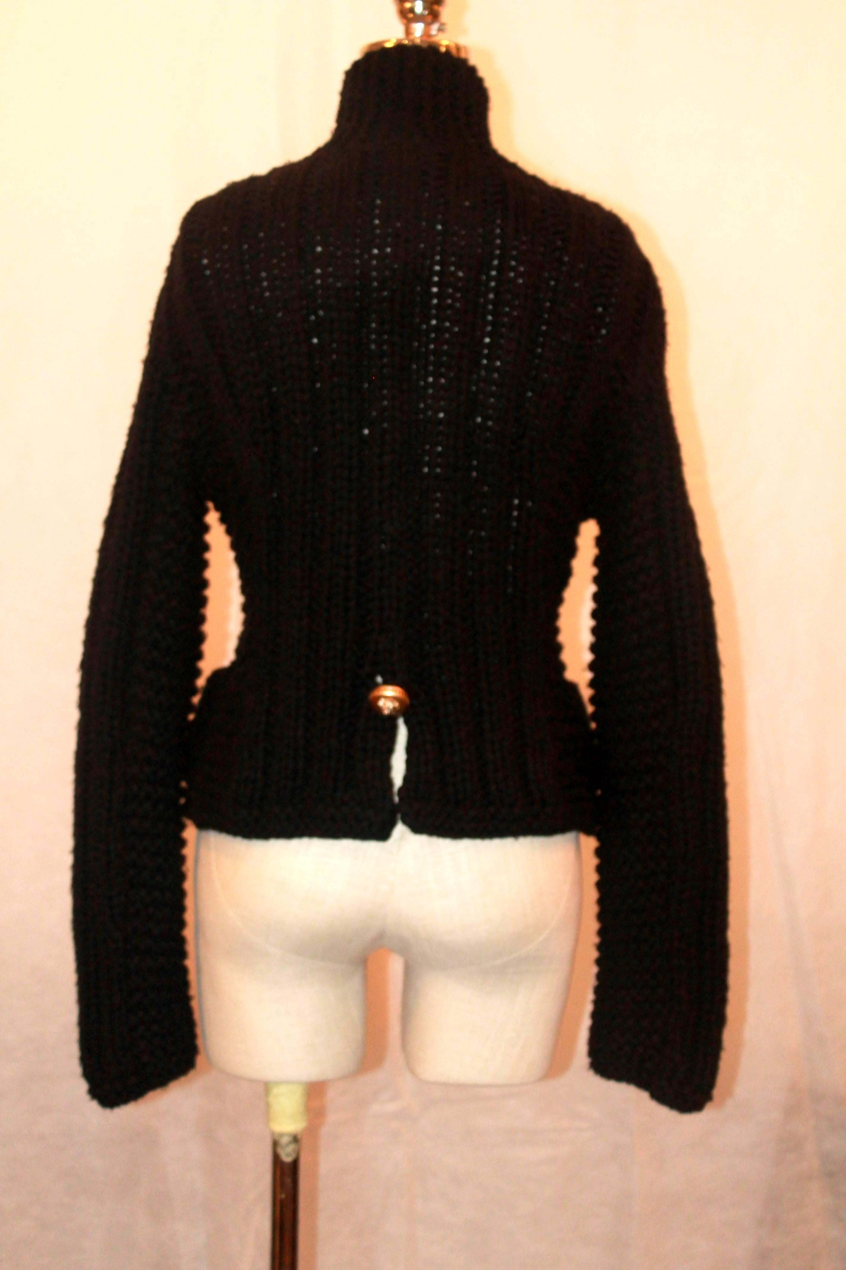 black sweater with gold buttons