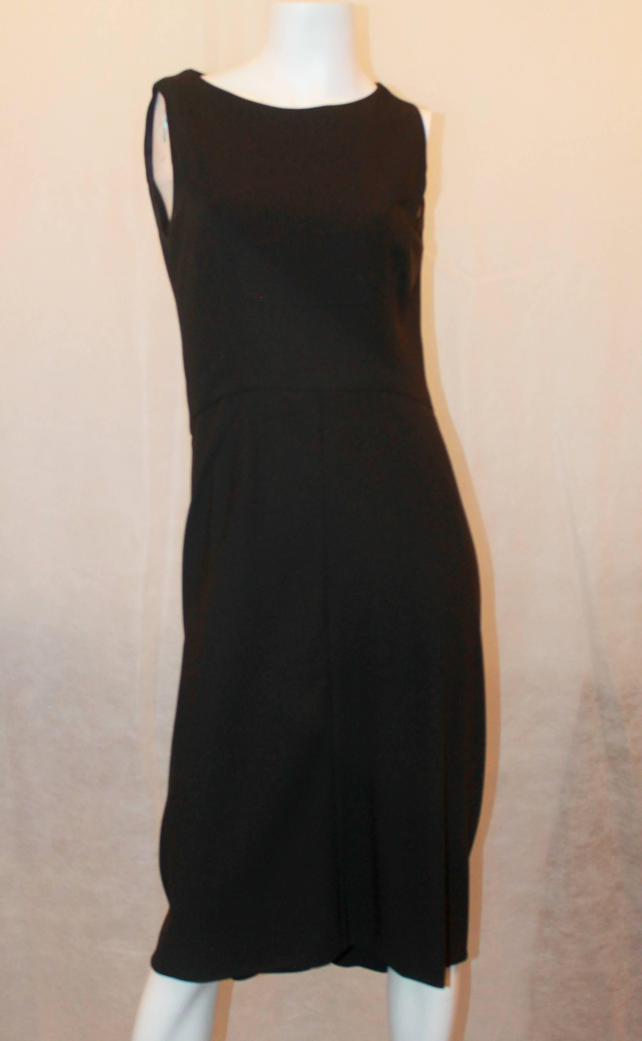 Chanel Black Wool Tapered Dress w/ Stitched Fitted Design & Train - 42 - 1999.  This classy Chanel dress is in excellent condition.  It features a silk lining, stitched fitted design in front, a back gathering, or train, design in the back with a