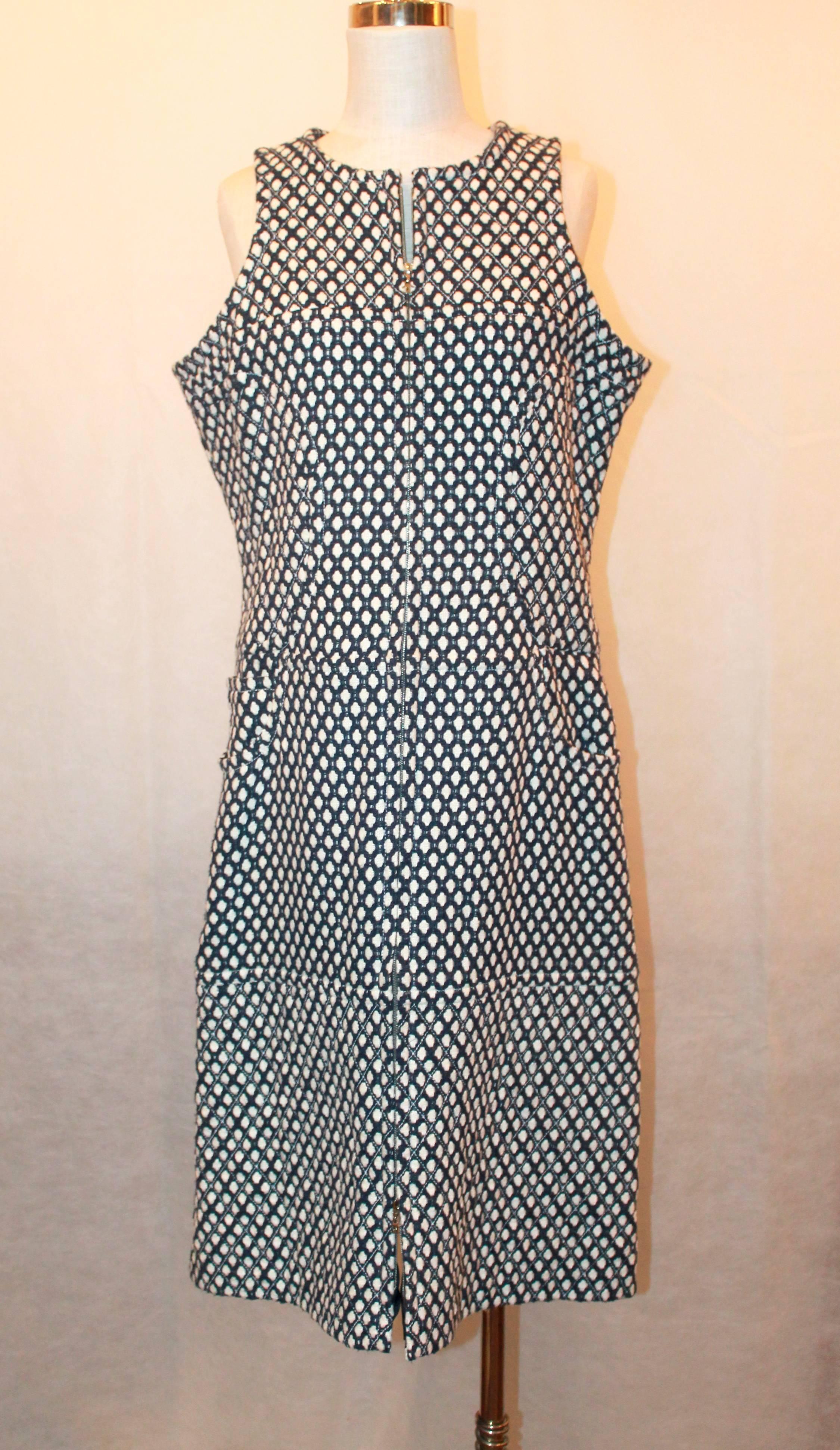 Chanel Navy & White Tweed Sleeveless Shift Dress w/ Front Zipper & Pockets - 42.  This beautiful Chanel dress is in excellent condition.  It features a shift shape, a silver 