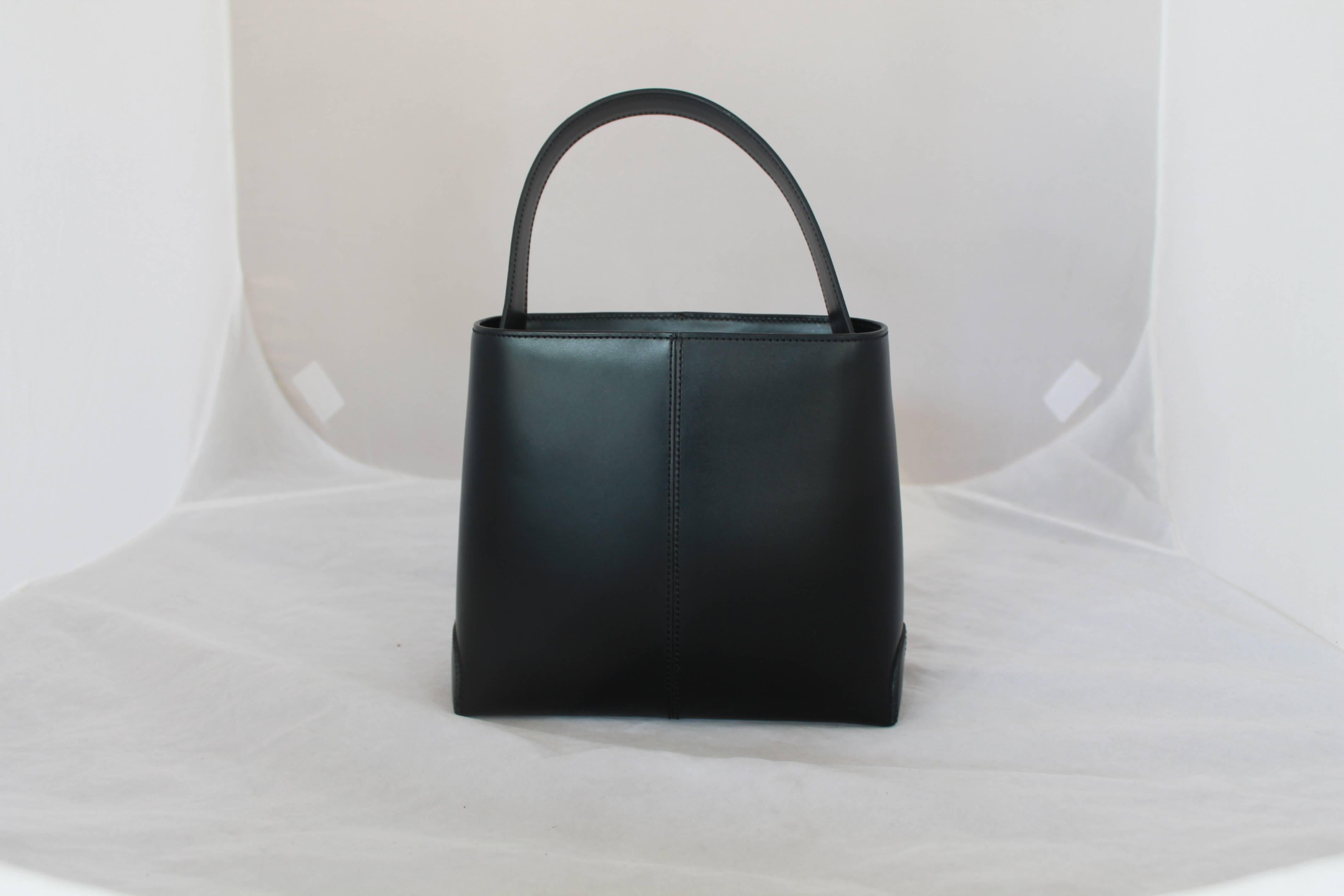 Tods Schwarze Ledertasche mit Henkel oben und Crossbody-Riemen SHW Damen