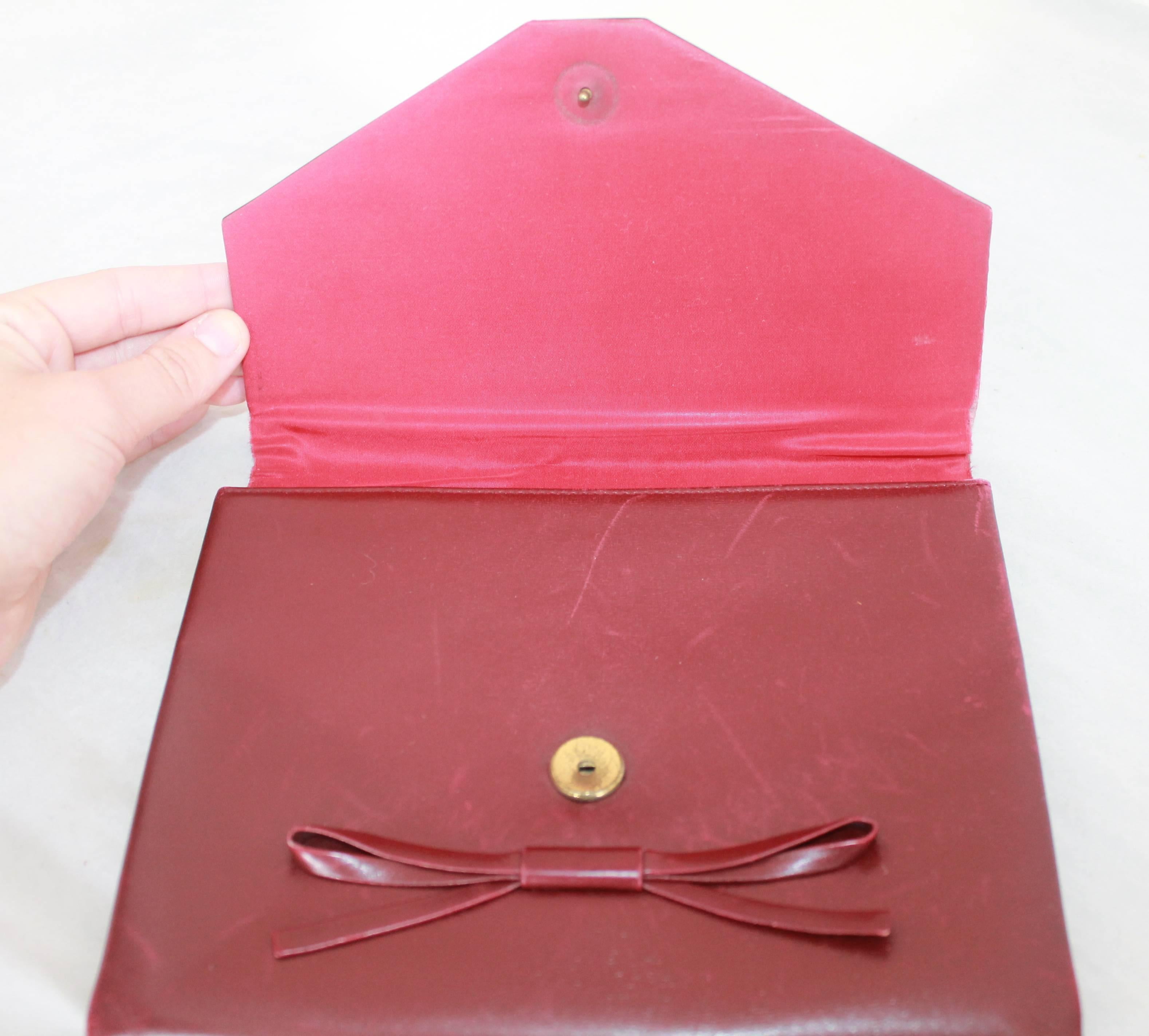 Black Christian Dior Vintage Burgundy Leather Clutch with Bow - circa 1990's For Sale