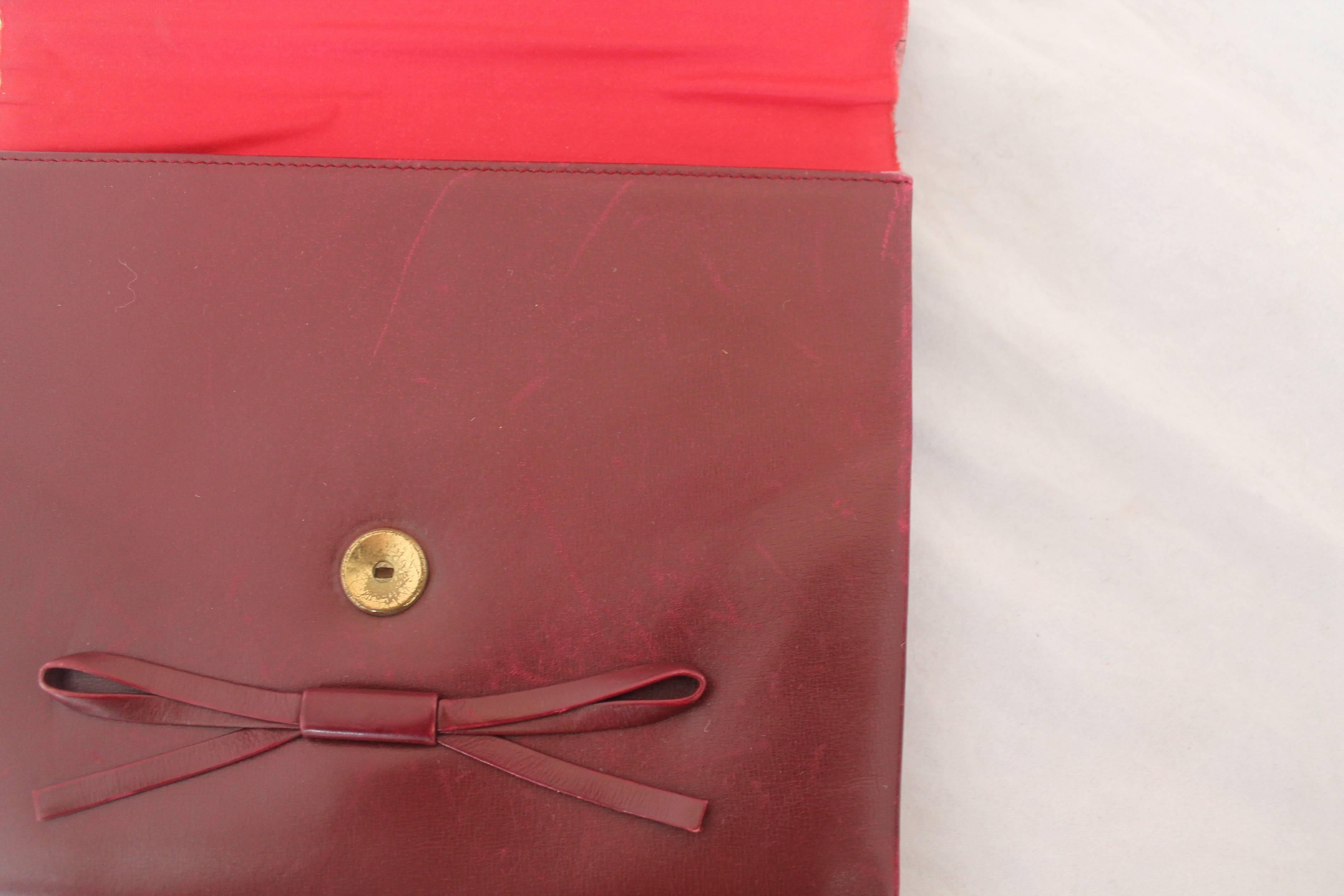 Women's Christian Dior Vintage Burgundy Leather Clutch with Bow - circa 1990's For Sale