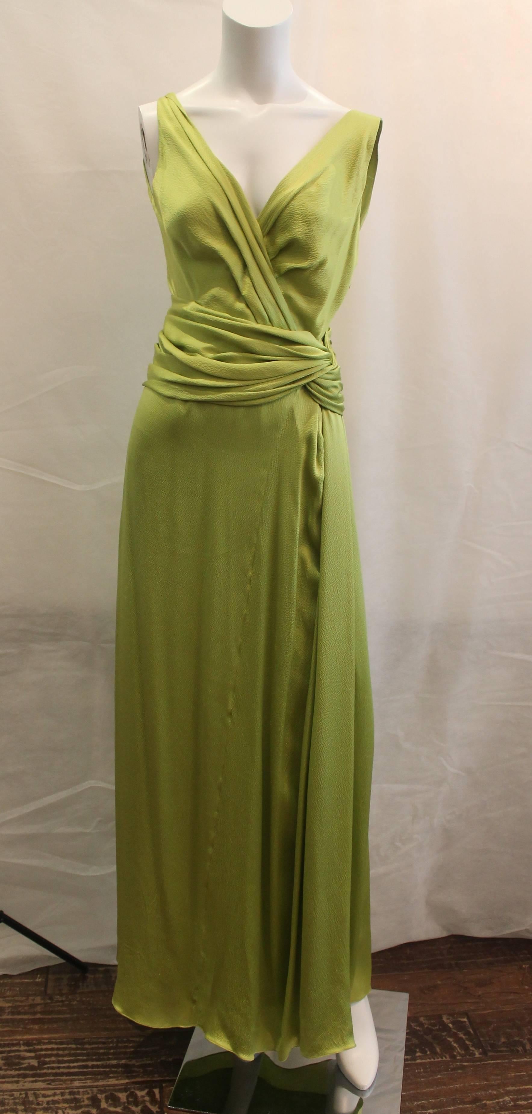 Christian Dior Canary Green Silk Sleeveless Ruched Gown - 2. This gown is in excellent condition with minor wear and has an extremely luxurious feel with its soft ruching throughout the bodice. This gown features a plunging v-neck, textured silk