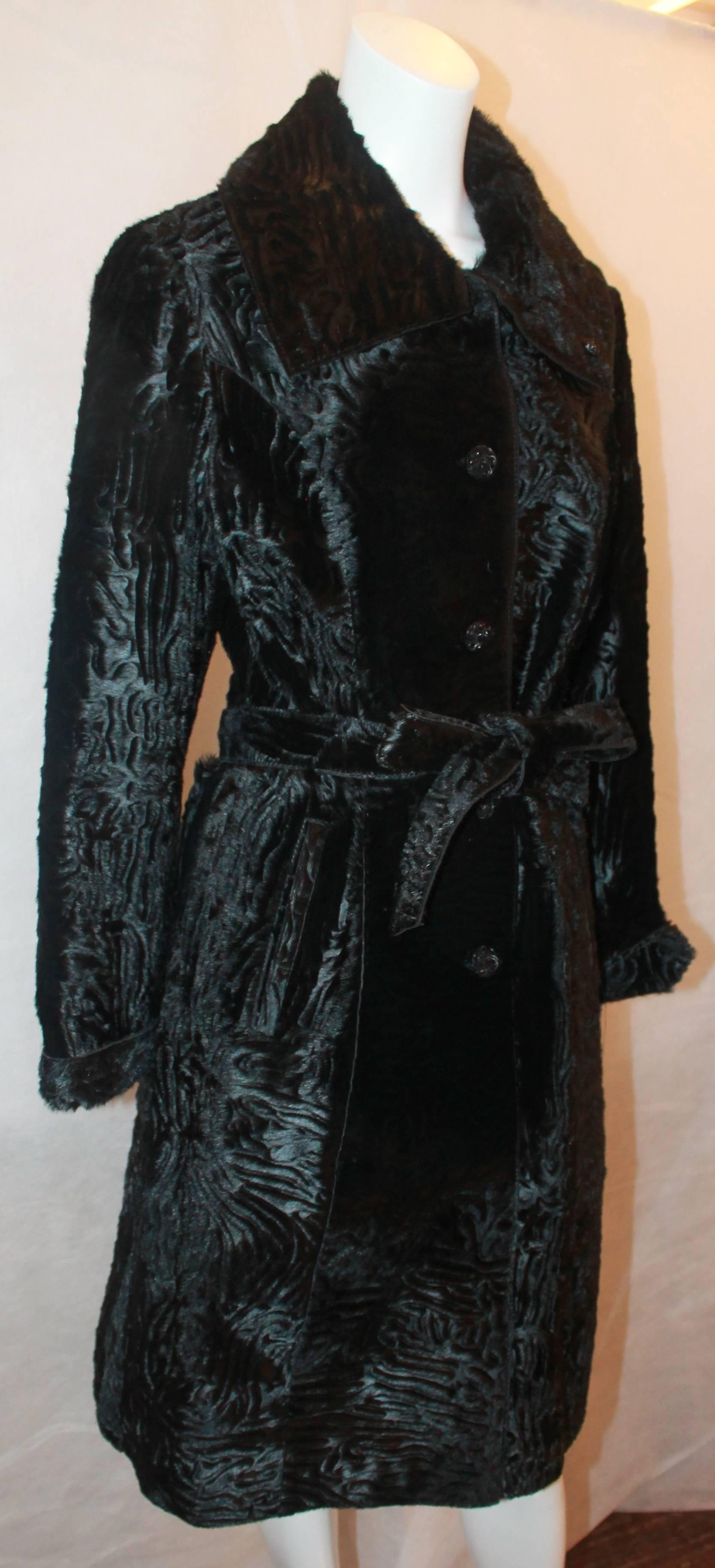 Marengo Black Broadtail Collared Full Coat with Belt - L. This coat has 2 front pockets and black rhinestone buttons. It is in excellent condition. 

Measurements:
Bust- 38