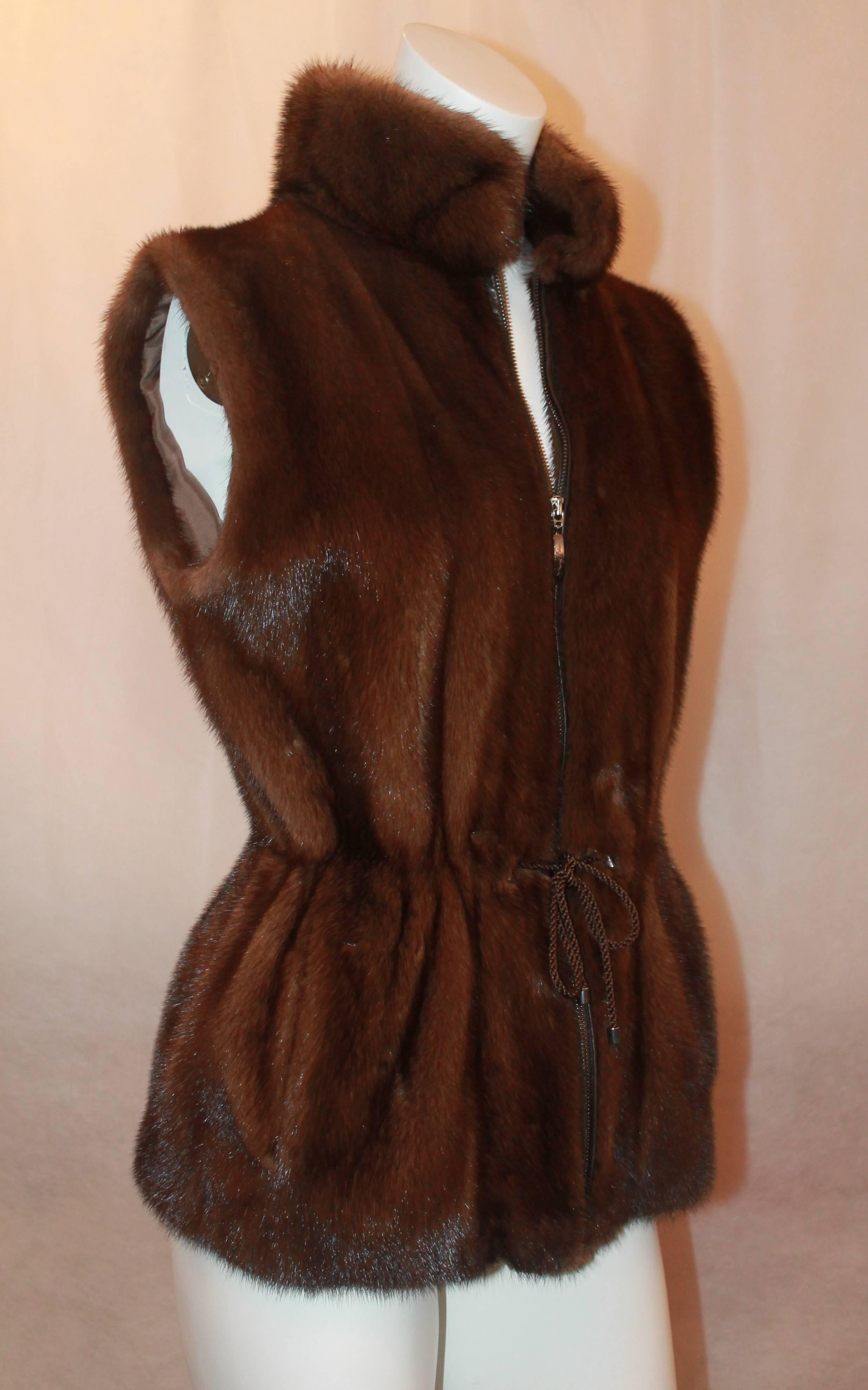 Sprung Freres Brown Mink Vest w/ Collar & Waist w/ Cinching Tie - 36.  This beautiful vest is in excellent condition.  It features gorgeous brown mink fur, a cinched waist with a ties, a full front zipper, and two front pockets.  This is a very