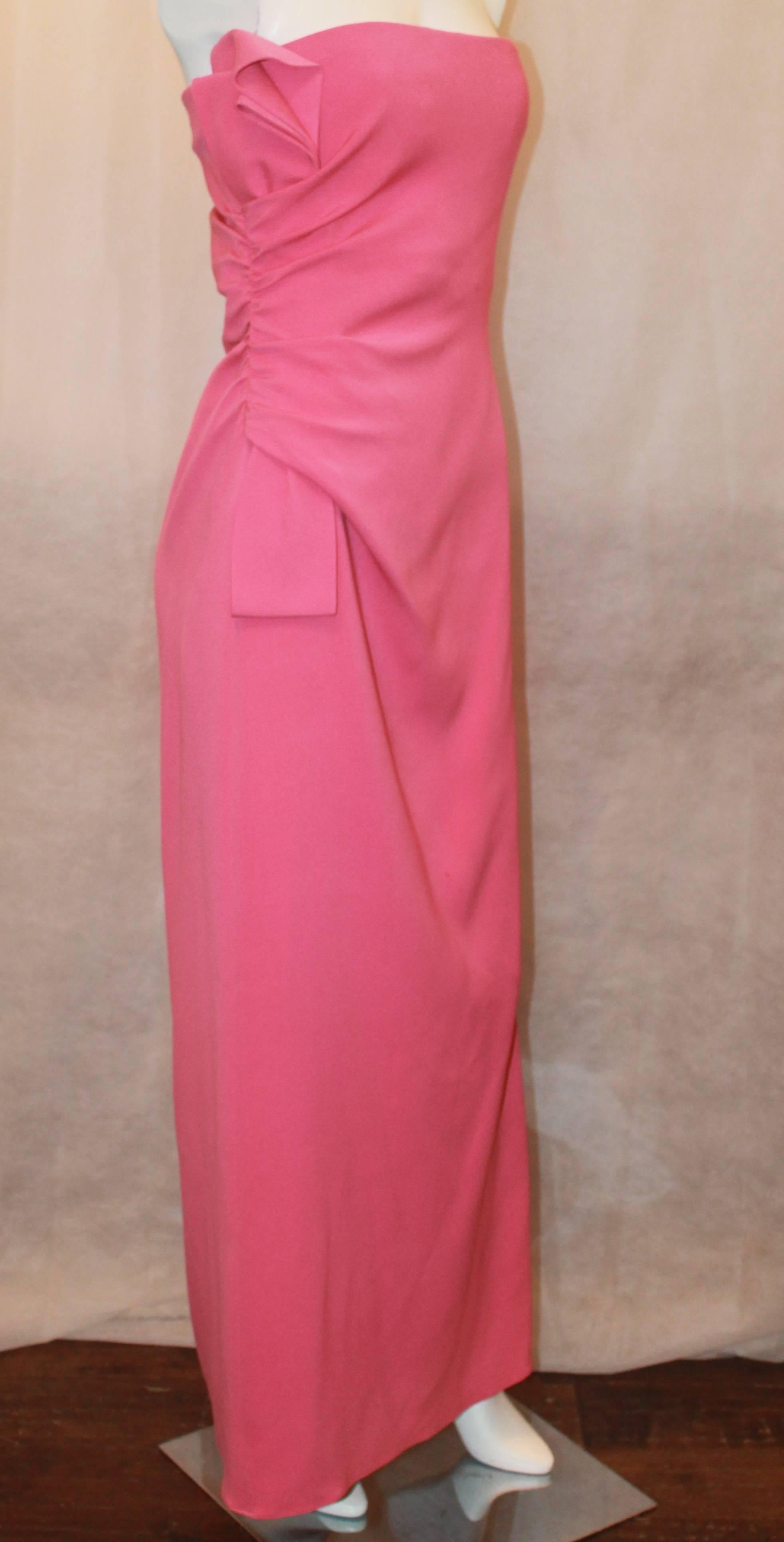 Valentino Pink Silk Strapless Gown w/ Side Ruching - L.  This lovely gown is in very good condition with minor general wear throughout.  It features a side ruching with a bow design and a side zipper.

Measurements: 34
