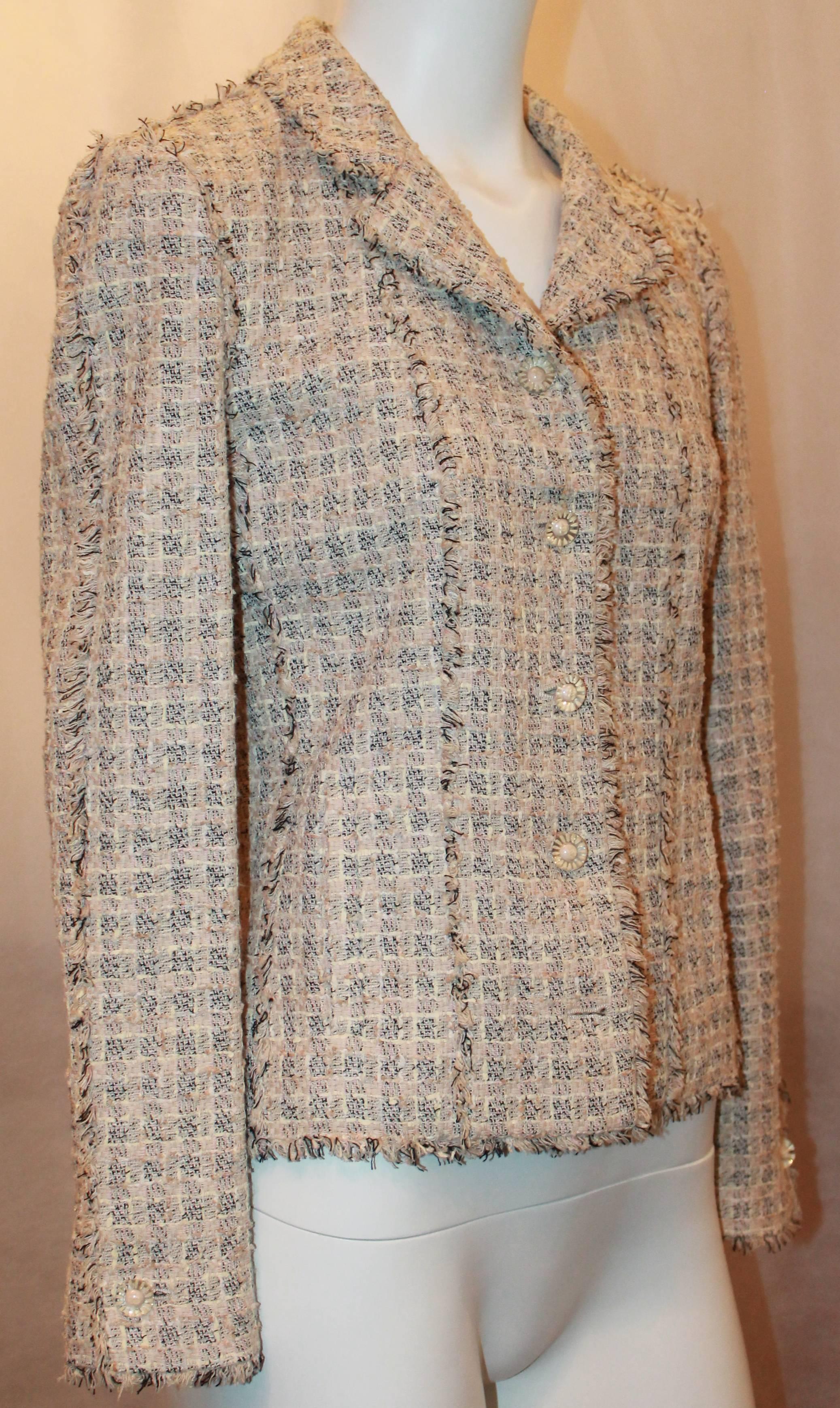 Chanel Blush, Cream, and Black Tweed Jacket w/ Fringe - 38.  This lovely Chanel jacket is in excellent condition.  It features a blush, ivory and black checkered pattern, two faux front pockets, and Lucite buttons with the 