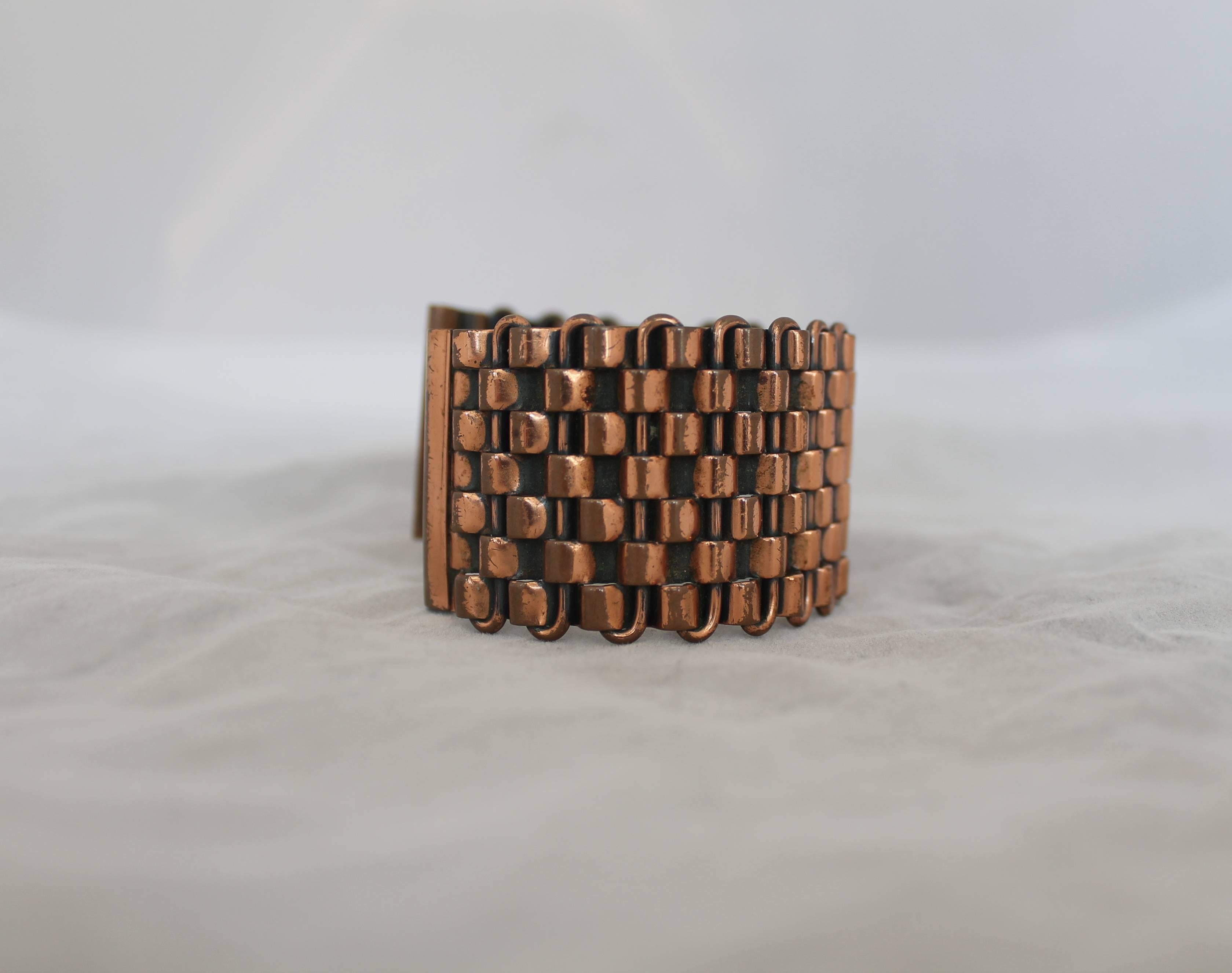 Renoir Vintage Copper Basket Weave Cuff Bracelet - 1950's.  This bracelet is in very good vintage condition with only some minor wear consistent with age.  It features an intricate basket weave look, the 