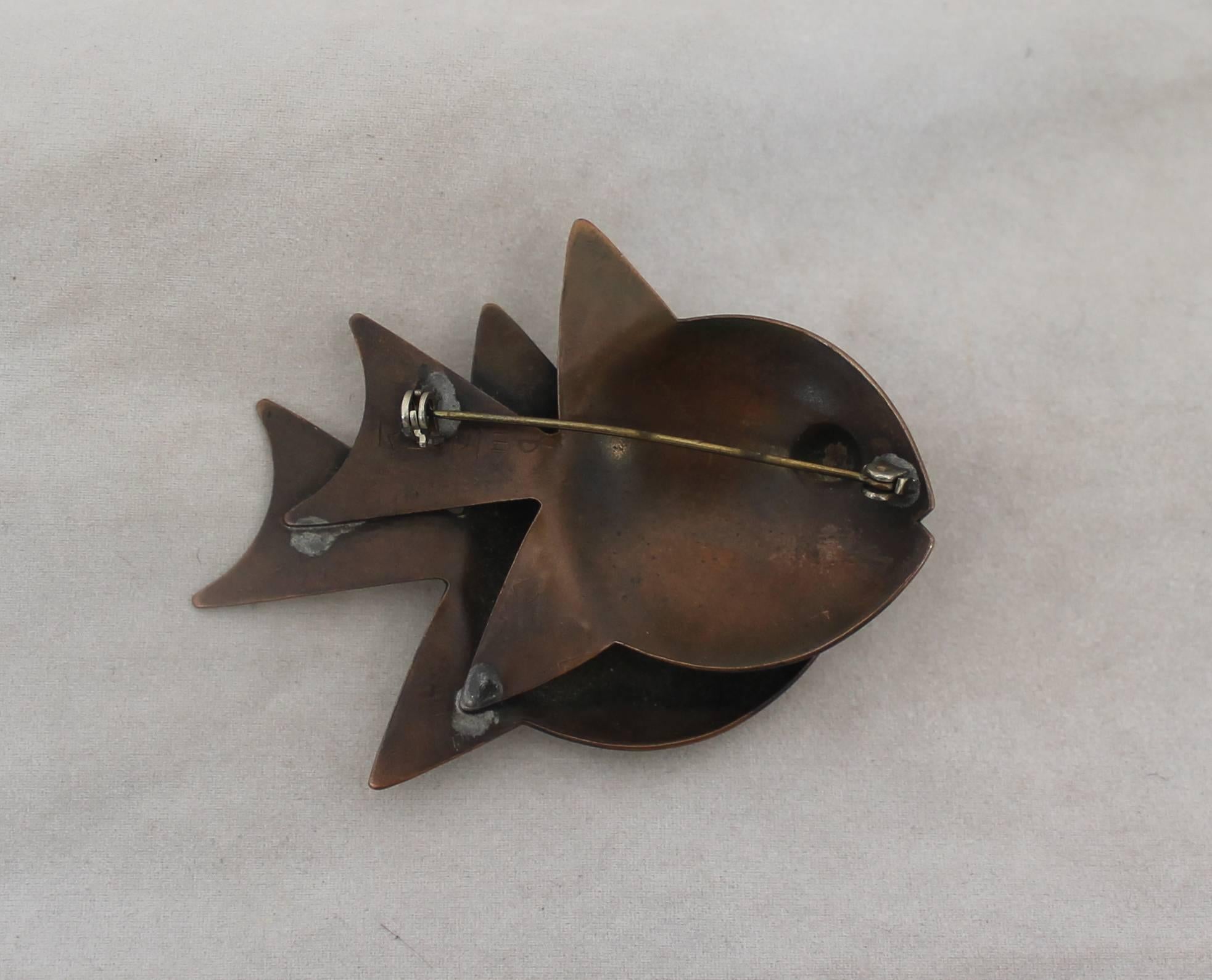 Rebajes Copper Double Fish Brooch - Circa 1950's.  This vintage brooch is in very good vintage condition with only some wear consistent with its age.  It features a 