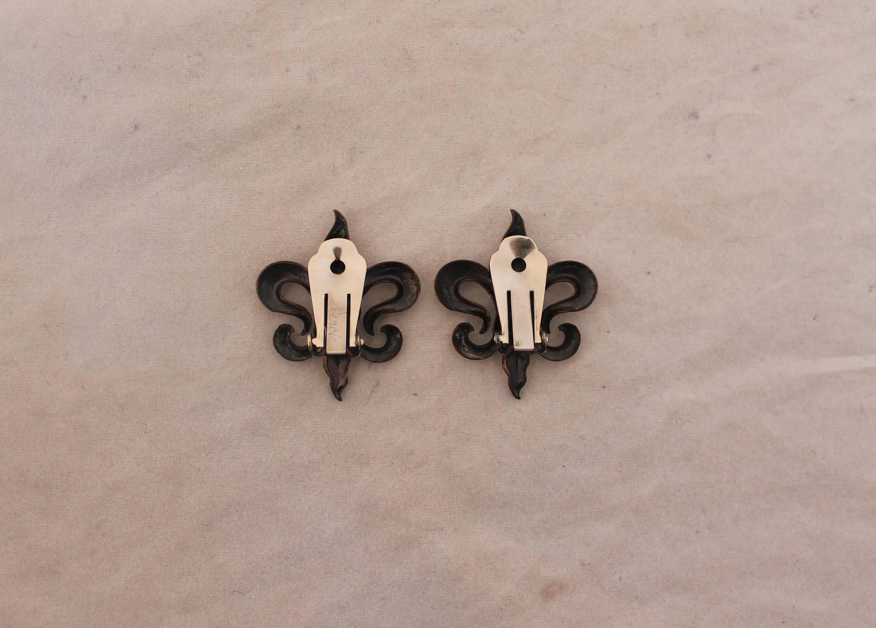 Renoir Vintage Fleur de Lis/Royal Spade Copper Clip Earrings - 1950's.  These lovely vintage earrings are in good vintage condition with some wear consistent with their age.  They feature a 
