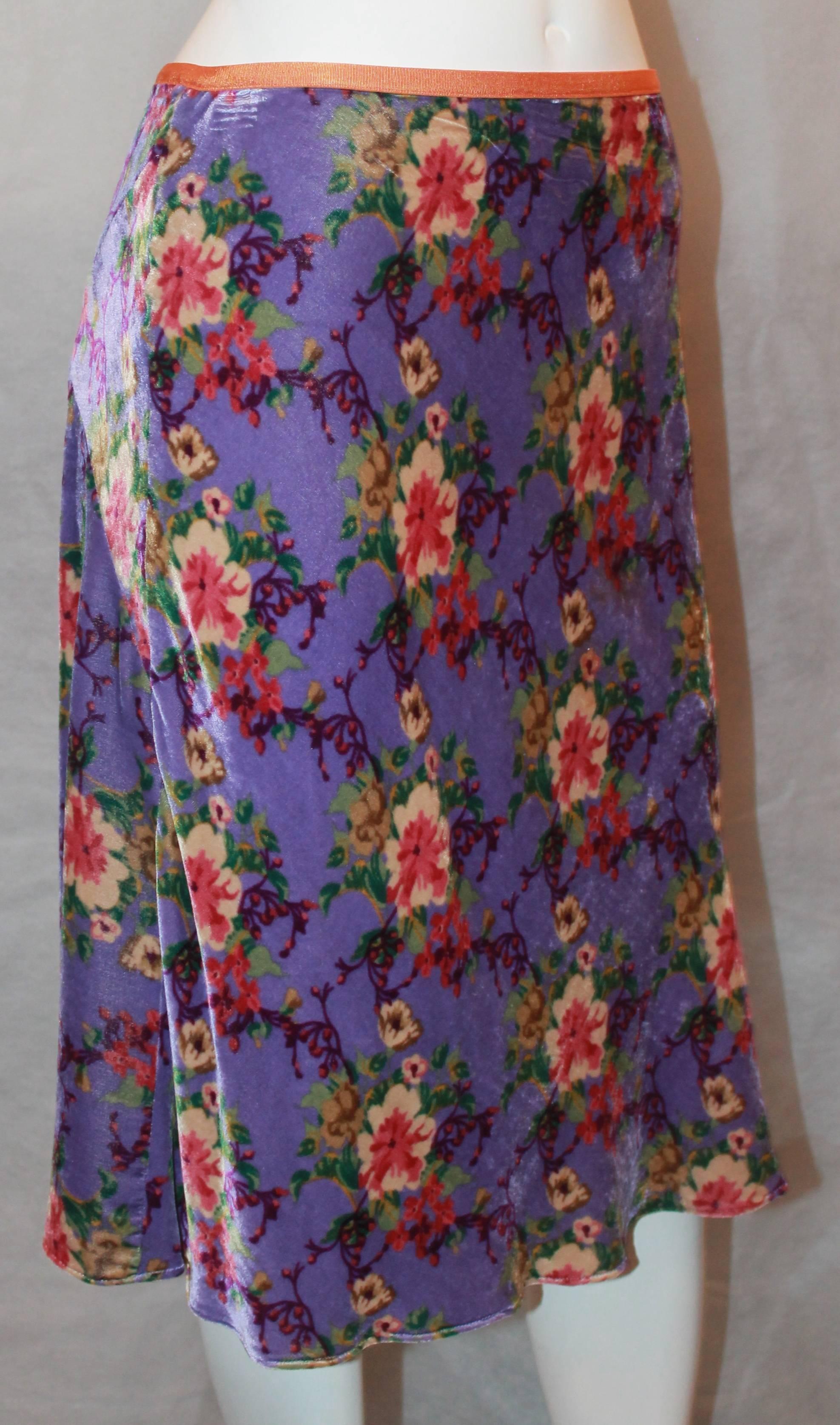 Etro Purple Velvet A-Line Skirt w/ Subtle Fish Tail & Floral Pattern - 8/42.  This beautiful skirt is in excellent condition.  It features a lovely floral pattern, a thin orange waistband, and a subtle fish tail in the back.

Measurements:
Waist: