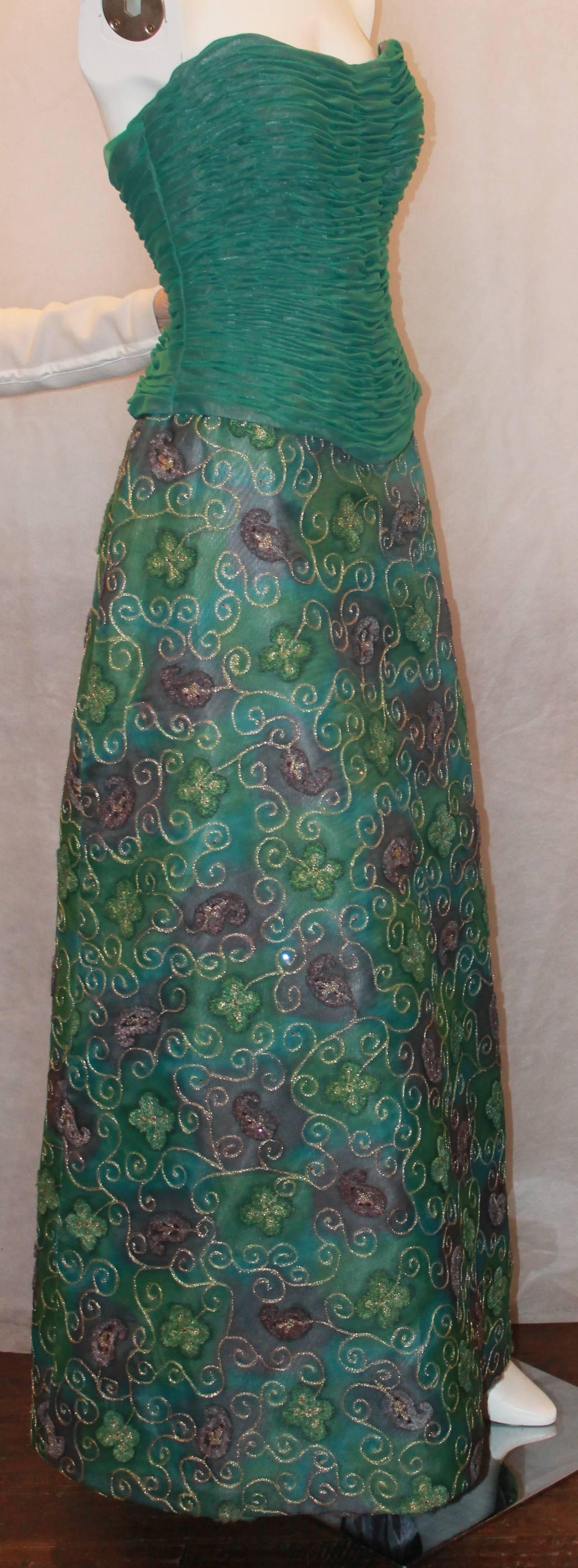 Rose Taft Vintage Purple & Teal Silk Blend Strapless Gown w/ Floral Design - 10.  This lovely vintage gown is in excellent condition.  It features a purple and teal silk blend material, a ruched metallic top, and an embroidered floral design on the