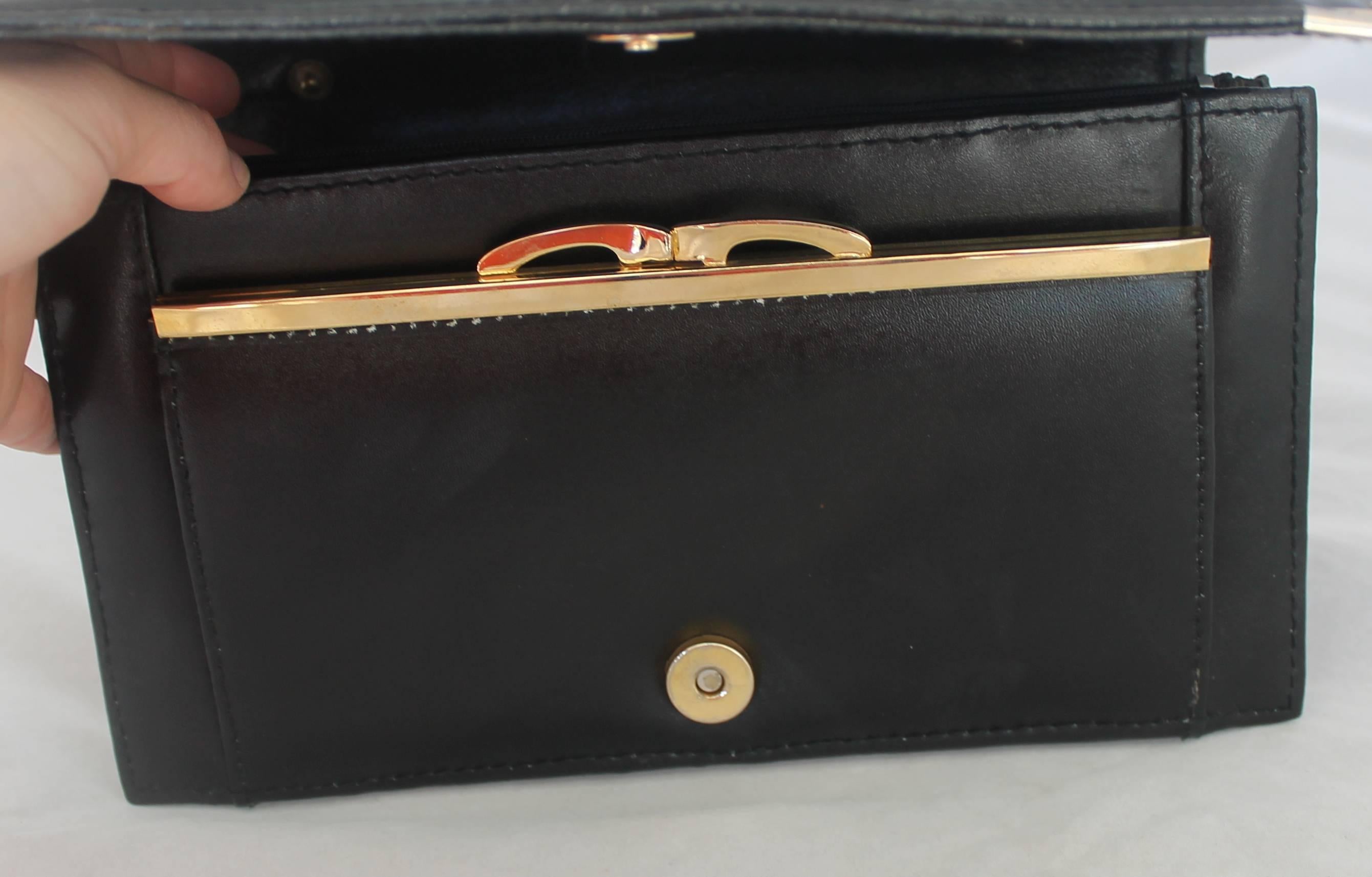 Christian Dior Vintage Clutch aus schwarzem Leder mit goldener Hardware, ca. 1980er Jahre Damen