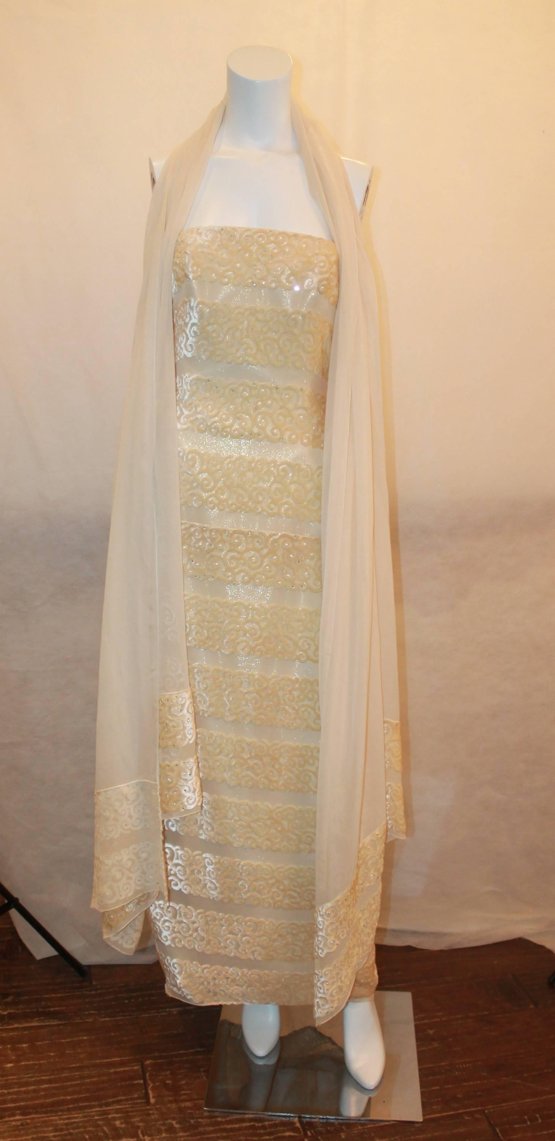 Michael Casey Silk Chiffon & Ivory Cut Velvet Strapless Gown - 10.  This gorgeous gown is in excellent condition.  It features a gorgeous ivory silk chiffon material, paneled velvet swirls, a straight across neckline, a gathered bustled back with