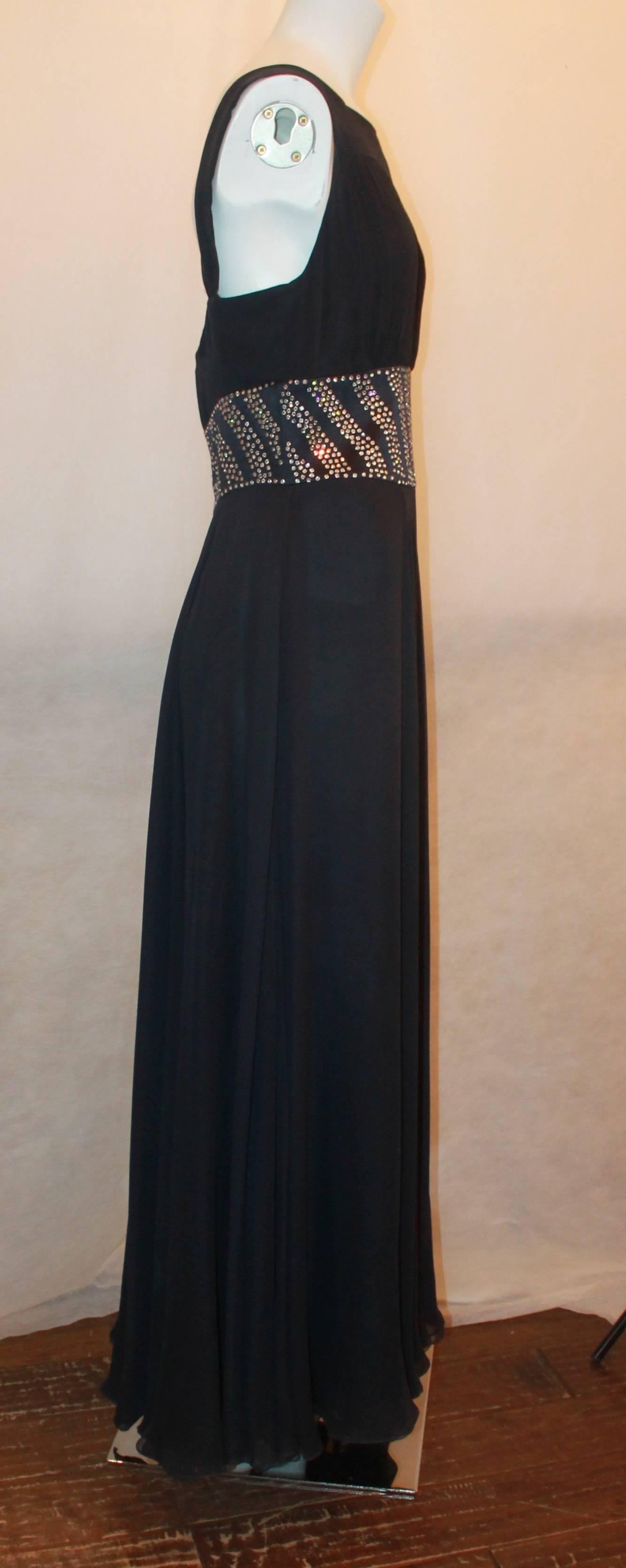 Reem Acra Navy Silk Chiffon Gown w/ Rhinestones, Ruched Bust, & Keyhole Slit -10.  This beautiful gown is in good condition with only a slight run on the left lower side.  It features a gorgeous navy silk chiffon, rhinestone detail around the waist,