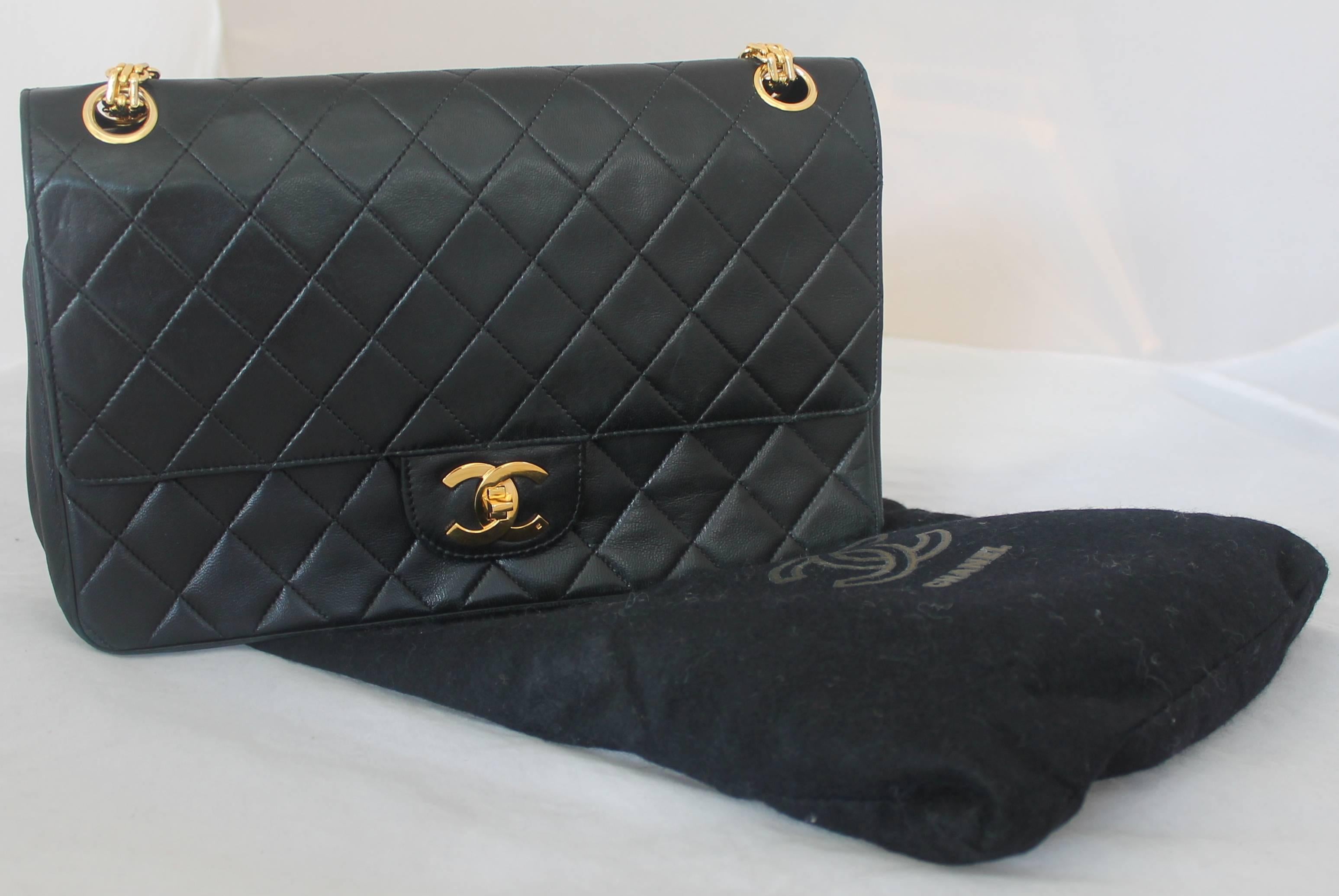 Women's Chanel Black Quilted Lambskin Classic Double Flap Handbag - GHW - Circa 1980's