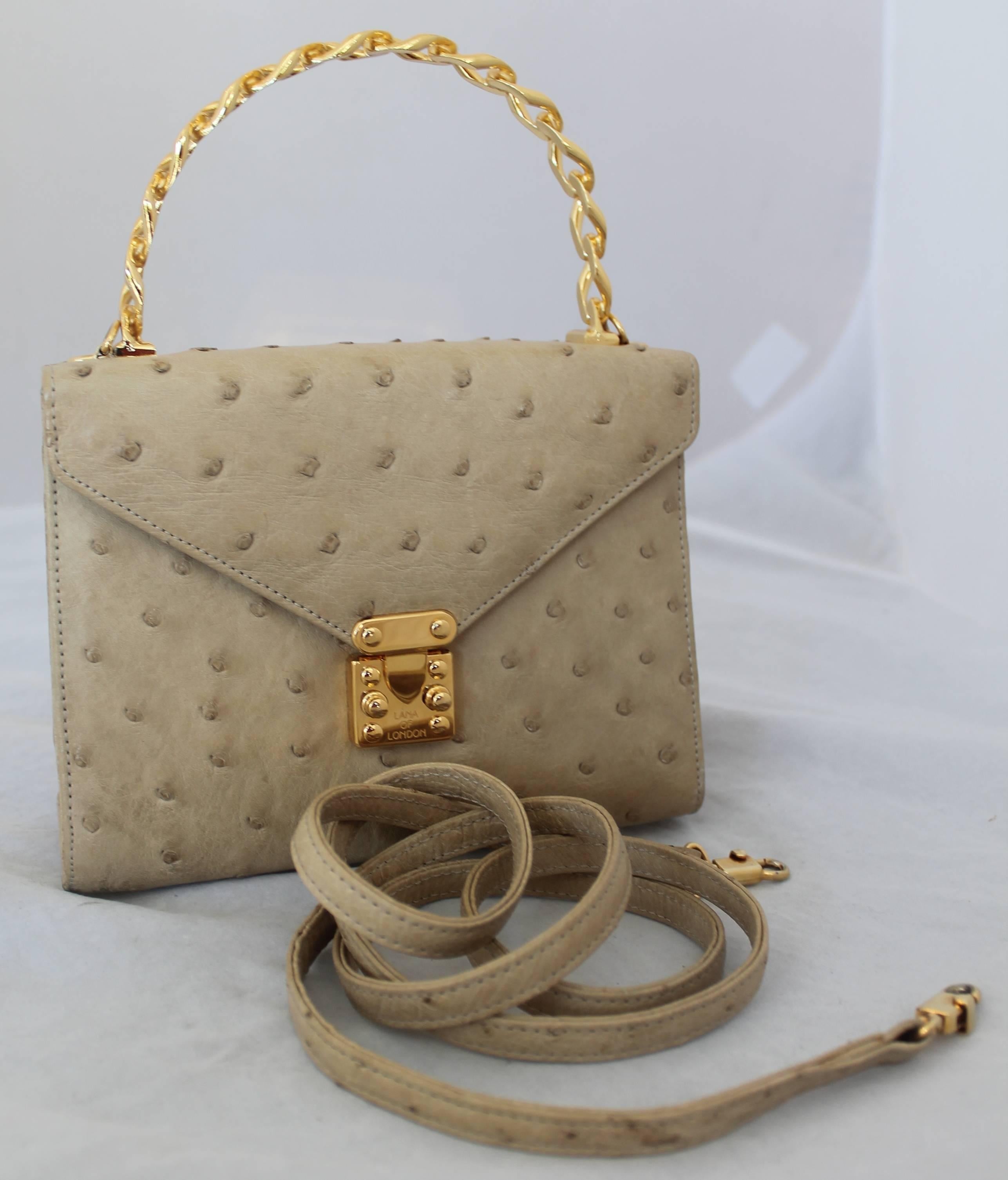 Lana Marks Vintage Beige Ostrich Small Top Handle Bag w/ Crossbody Strap - GHW.  This adorable vintage bag is in excellent condition.  It features a beautiful ostrich exterior, a gold chain link top handle, a mirror, and a crossbody