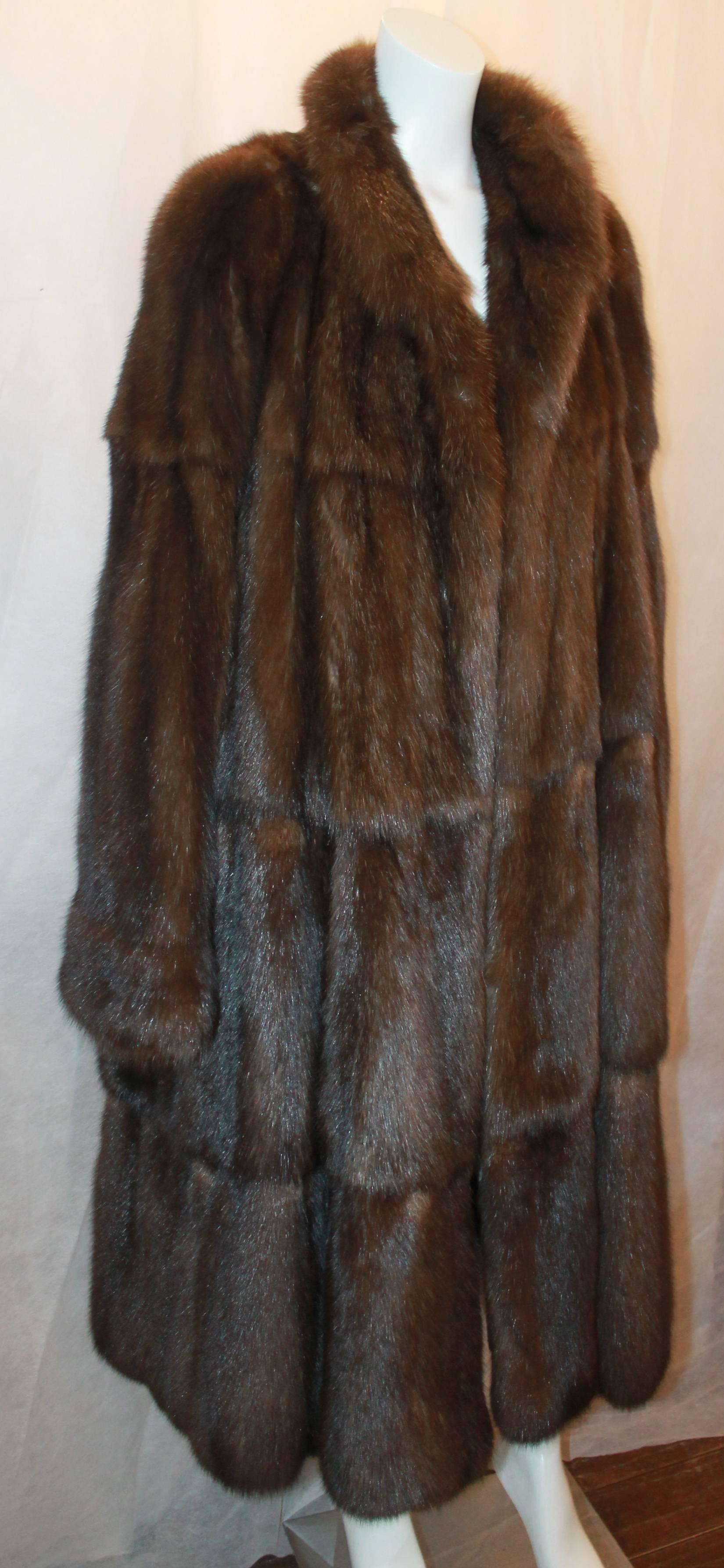 Valentino Vintage Brown Sable Fur Coat - L - circa 1980's .  This beautiful vintage fur coat is in excellent condition.  It features a gorgeous sable fur and a longer length.

Measurements:
Shoulder to Shoulder: 18