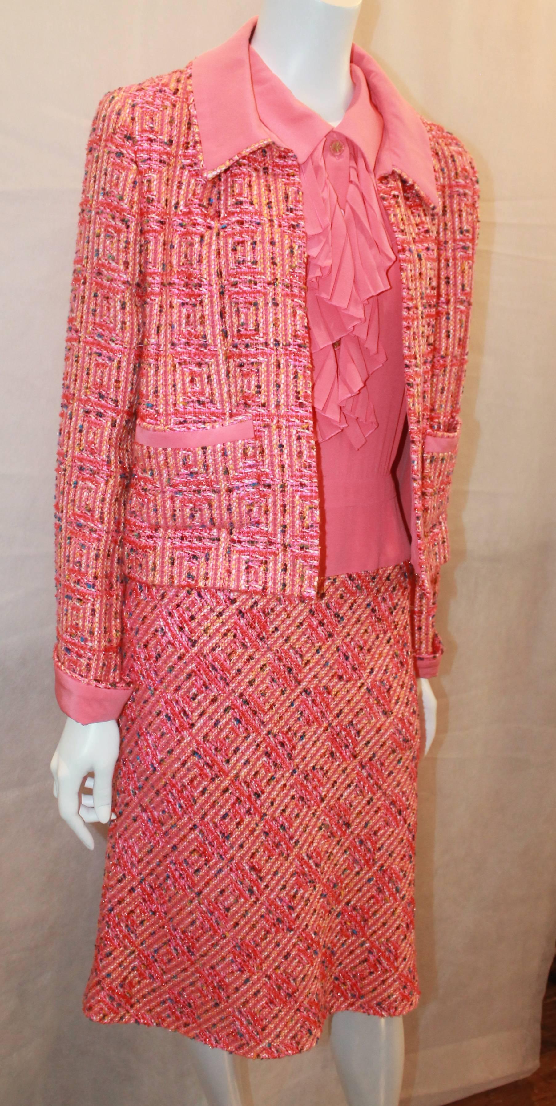 Chanel Pink & Multi-color Tweed and Dress & Jacket Set - 40 - 01C. These piece are perfect for a collector and are in excellent condition. The tweed is mainly a peach stitched in with metallic blue, purple, green, and yellow. The blouse sleeveless