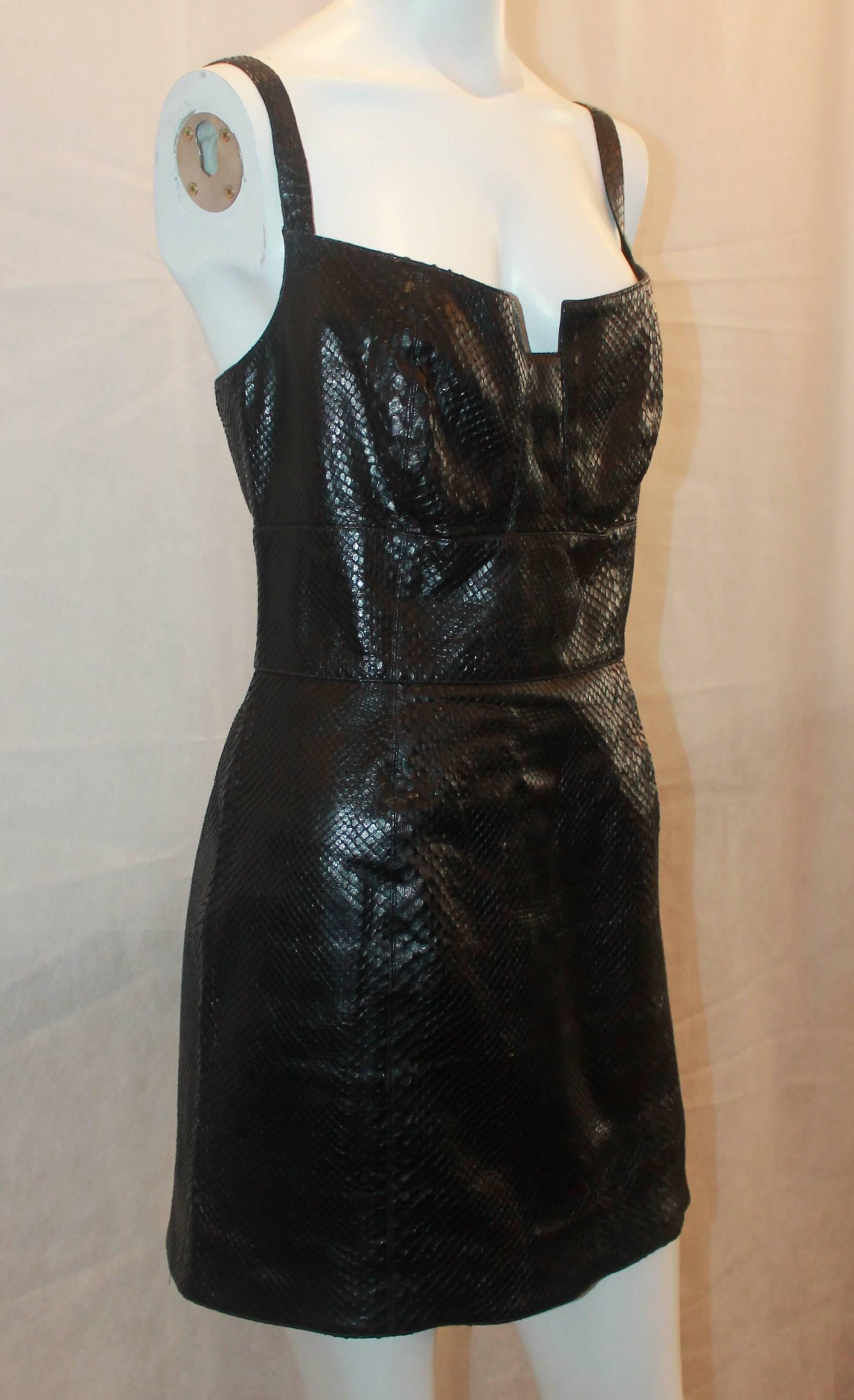 Claude Montana Por Ideal Cuir Vintage Black Snakeskin Spaghetti Strap Dress - 40.  This dress is in good condition with only minor lifting of the snake scales.  It features a striking black snakeskin, spaghetti straps, a shapely style on the bust