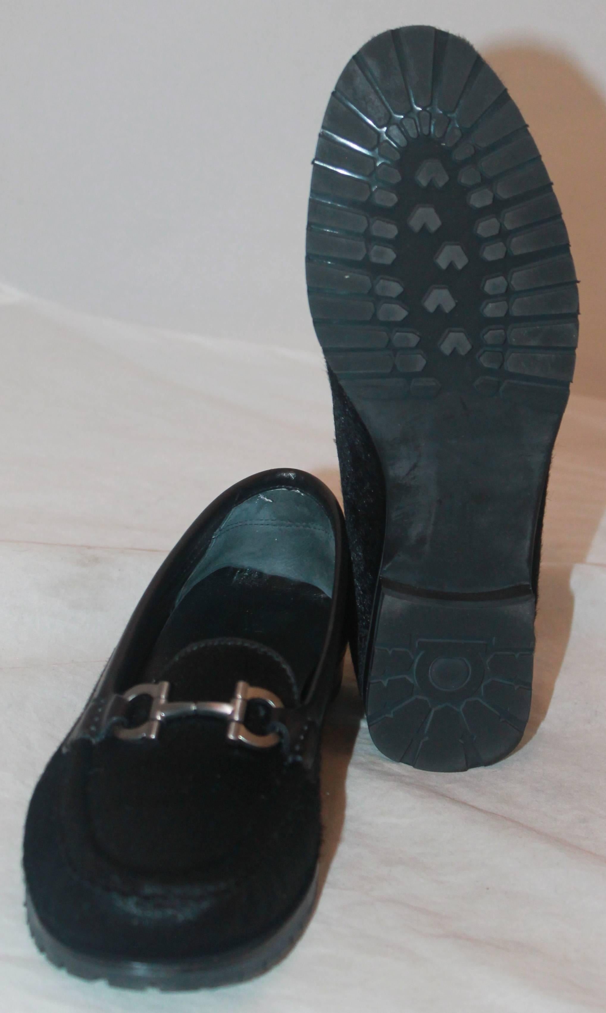 black and silver loafers