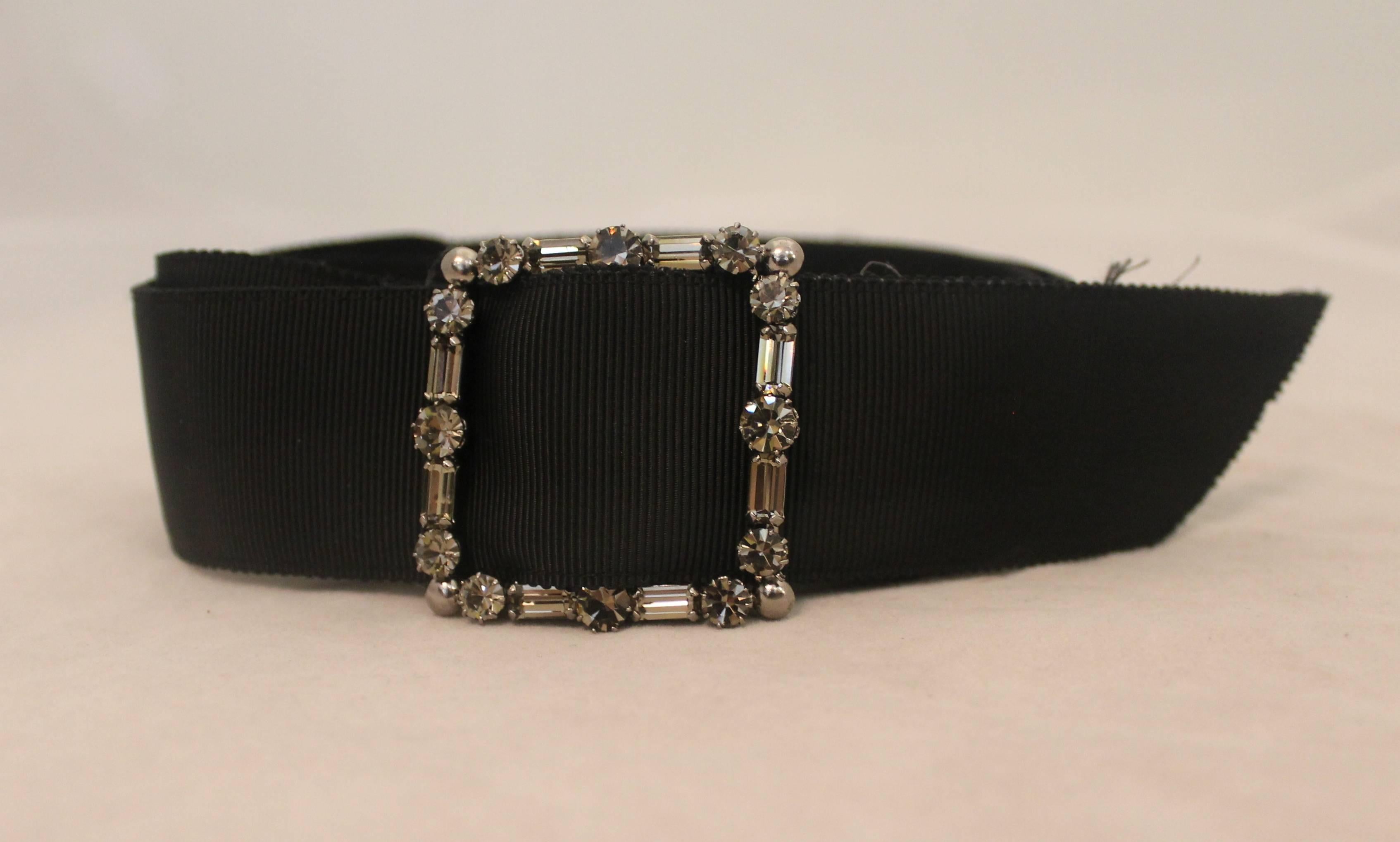 Lanvin Black Silk Faille Belt w/ Crystal Buckle - Circa 2006.  This lovely belt is in excellent condition.  It features an elegant black silk faille and a crystal buckle.  It is from the 2006 collection.

Measurements:
Belt:
-Length: