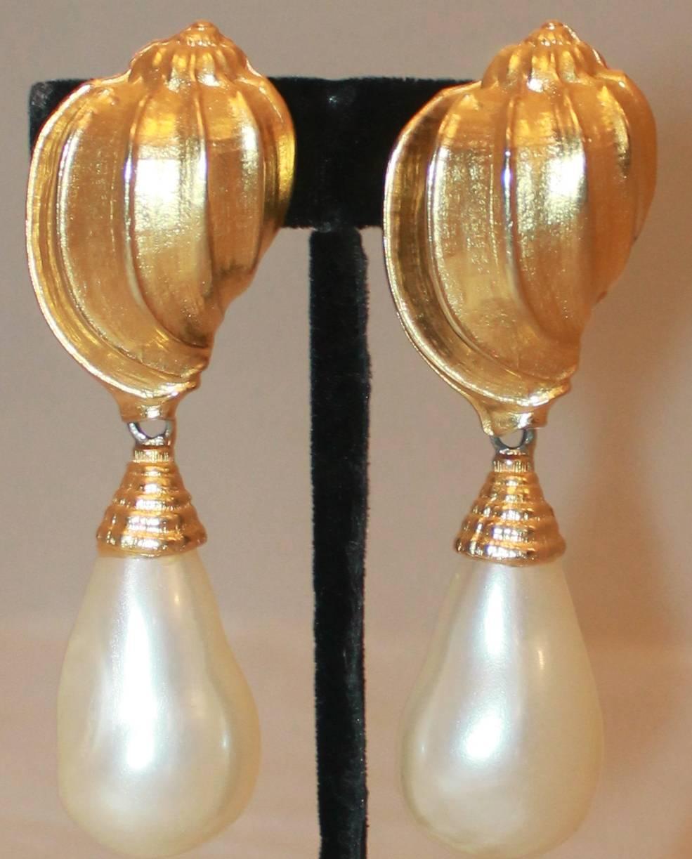 Ben Amun Gold Vintage Gold Seashell & Pearl Drop Earrings - circa 1980's. These clip-on earrings are in excellent vintage condition and have a gorgeous shape.

Length- 3.5