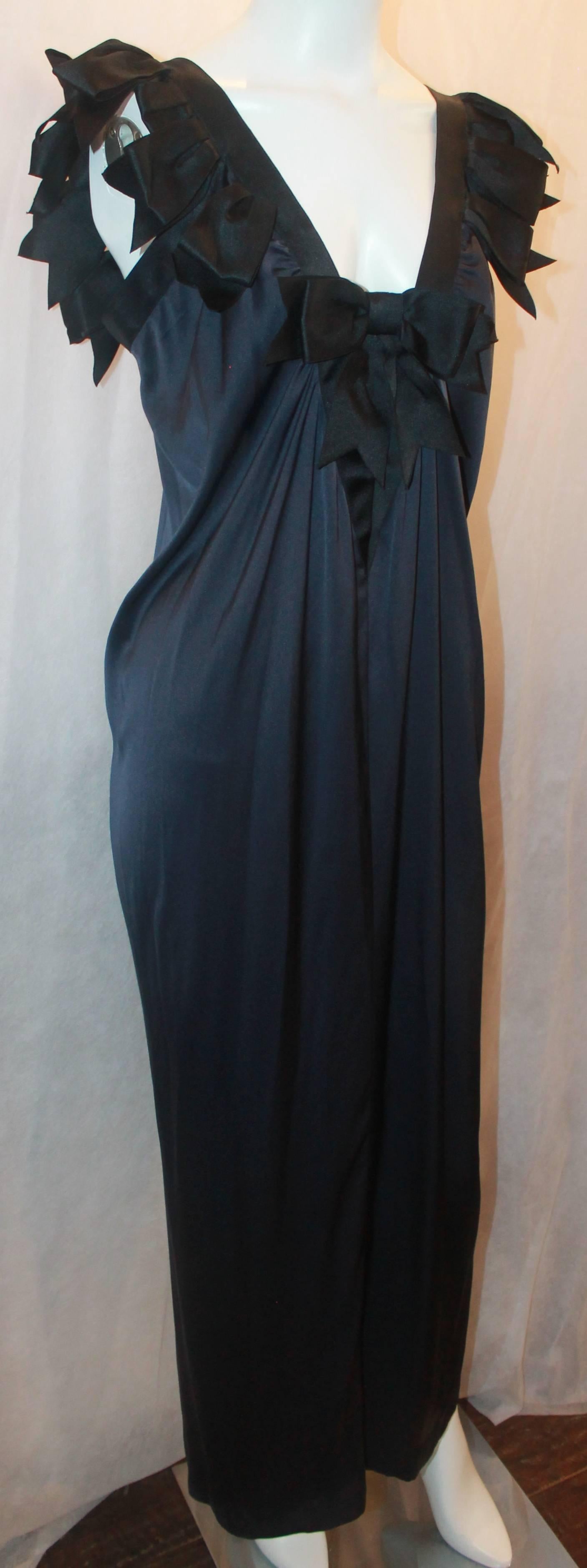 Chanel Navy Silk Gown with Black Bows - 42 - 09C. This gown is in excellent condition and is a gorgeous, signature Chanel piece. The gown has a ruched appearance in the front with bows all along the neckline. The back of the gown  also has a