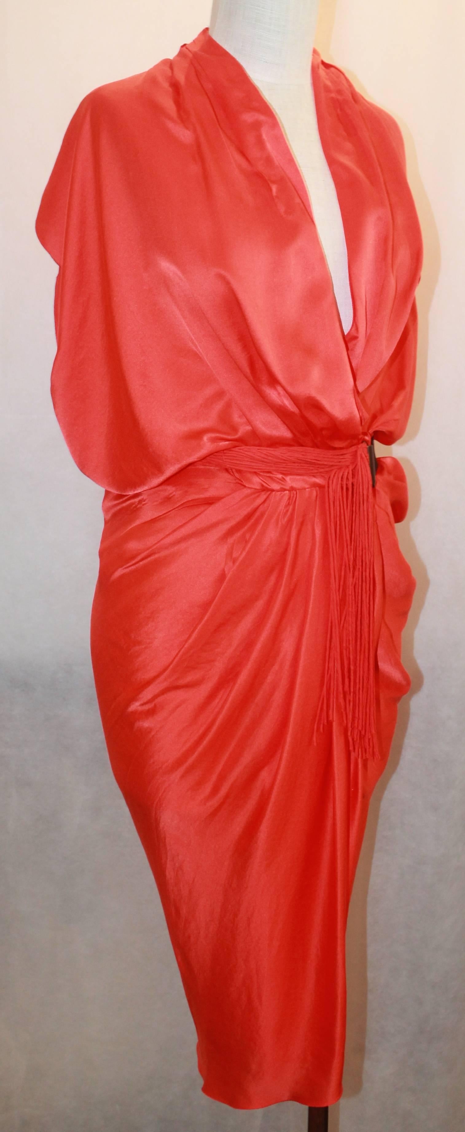 Lanvin Burnt Orange Ruched Silk Dress with Belt - 38. This dress is in excellent condition and has a plunging neckline in the front. The belt has a casual, tropical feel and has tassels hanging with an elastic back. 

Measurements:
Bust-