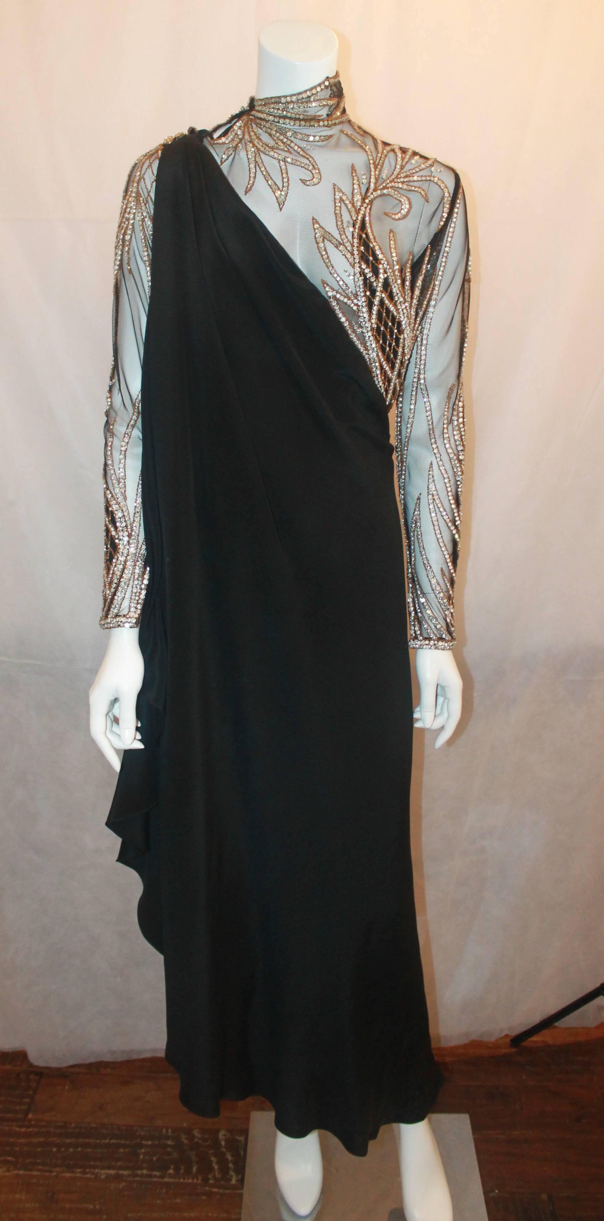 Bob Mackie Black & Gold Silk Jersey, Mesh, & Rhinestone Gown - M - Circa 1970's.  This incredible gown is in excellent vintage condition.  It features lovely black silk jersey and mesh materials.  It has intricate gold beading and clear sequins. 
