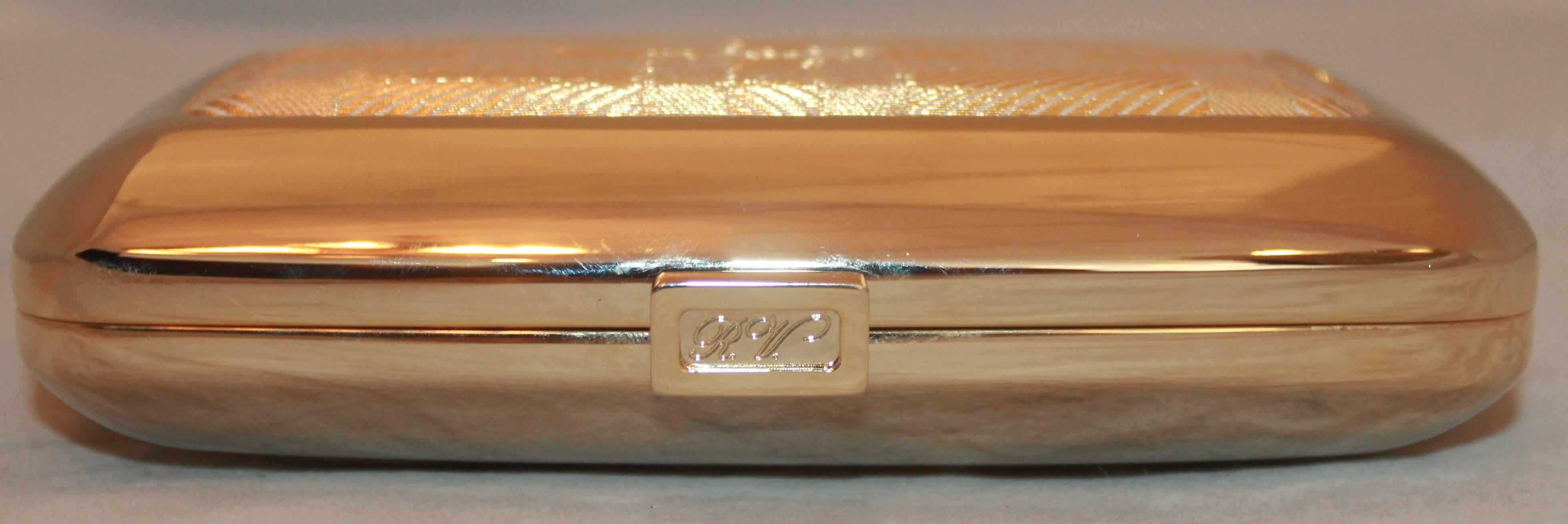 roger vivier silver clutch