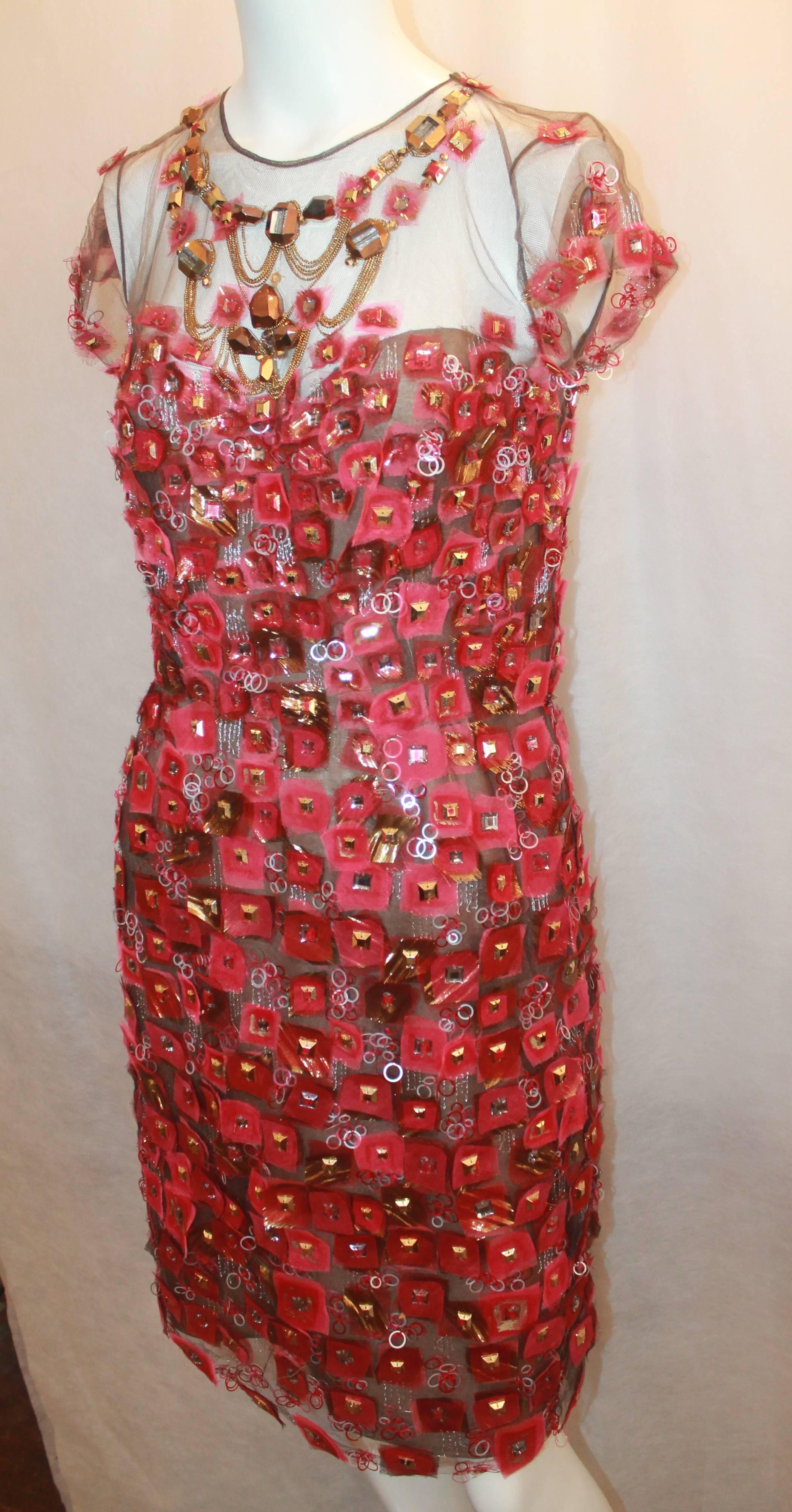 Oscar de la Renta Red, Brown, & Pink Tulle, Mesh, & Applique Short Sleeve Dress - 8.  This gorgeous dress is in excellent condition.  It features circular silver and red sequins, gold, silver, and red square stones, silver stitched detail, and a