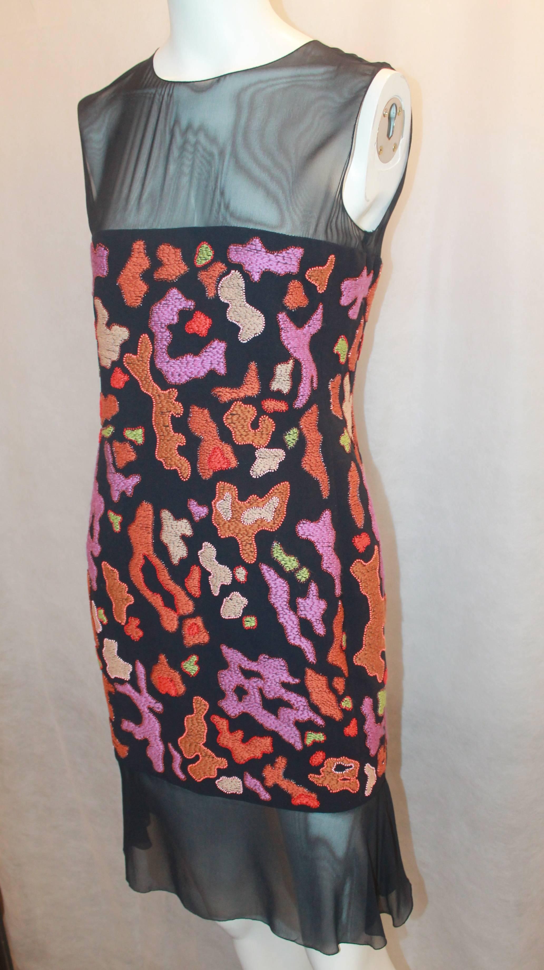 Chanel Navy & Multi-color Embroidered Silk Dress - 40 - 97A. This dress is in excellent condition with a heavy embroidered & beaded section in the middle of the bodice. The top and bottom are a sheer silk chiffon with the bottom having a