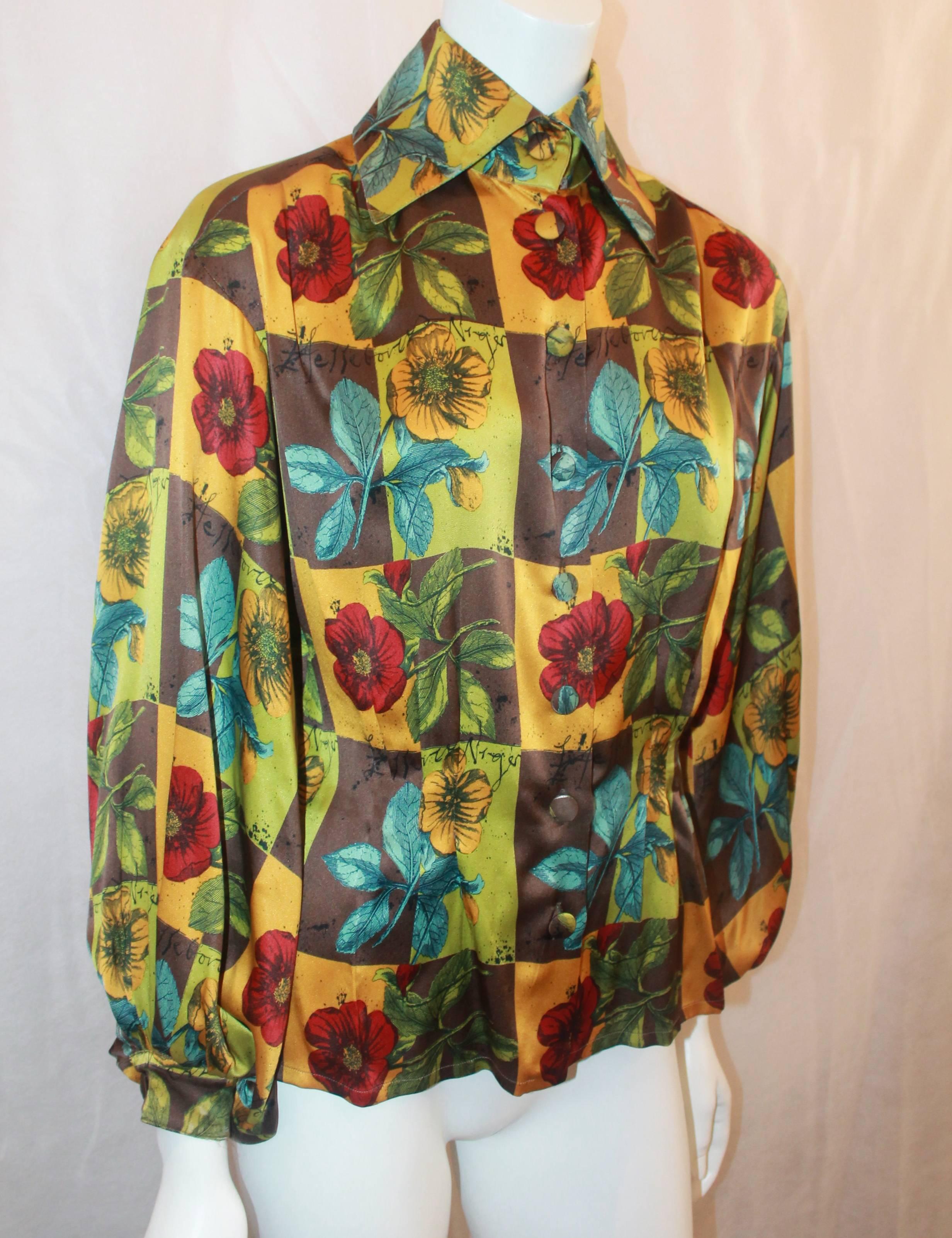 Christian Lacroix Silk Multi-color Floral Printed Blouse - 38. This blouse is in fair condition with a checkered print with flowers all over. The only issue is fraying near the end of the sleeves shown in the images. The blouse has a puffy sleeve
