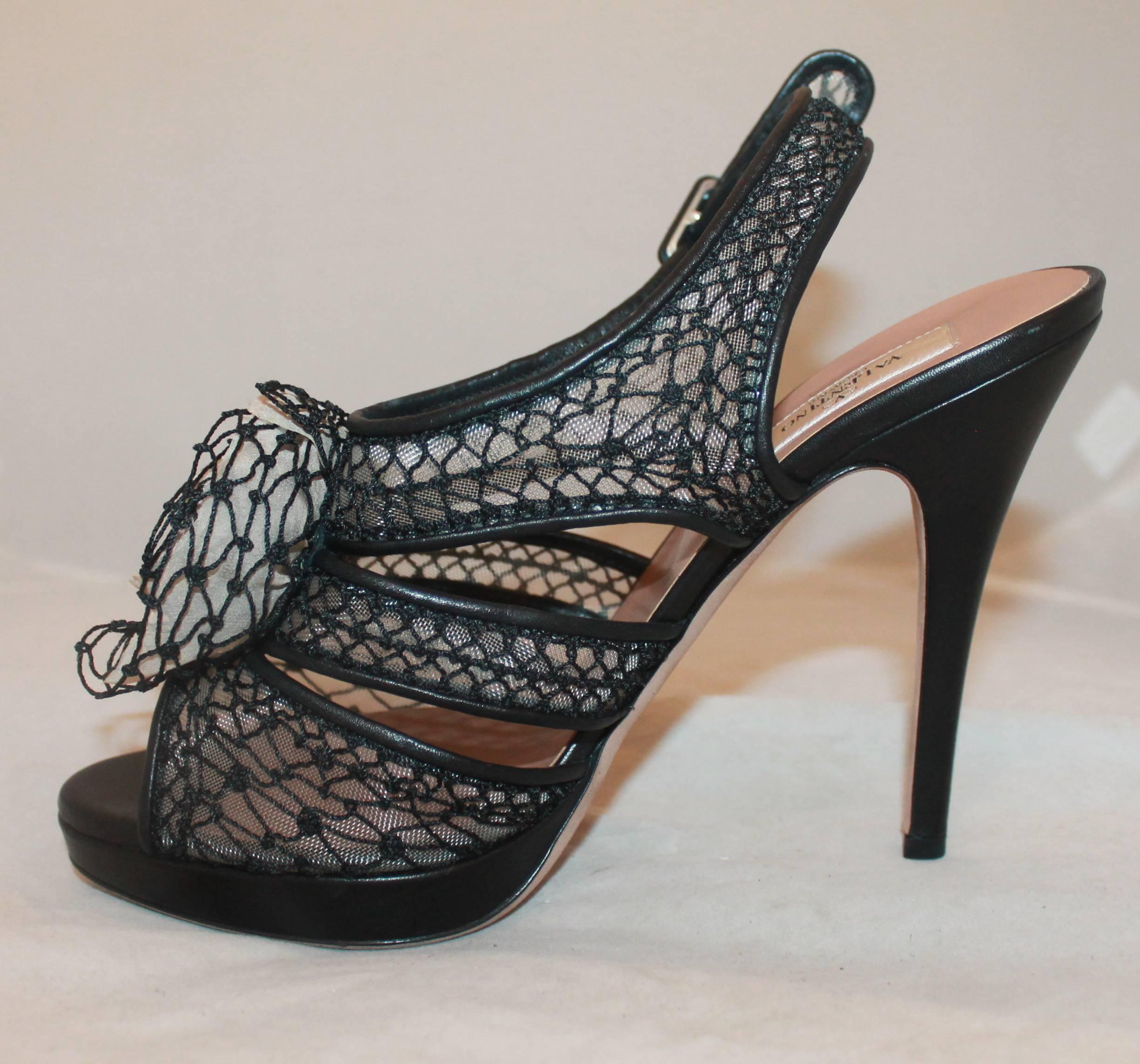 Valentino Beige & Black Mesh Woven Platform Heels with Rose on the Front - 39.5. These unique platform heels have a woven rose on the front, a leather heel, and a woven/ crochet-esque overlay. They are in excellent condition and show very minor