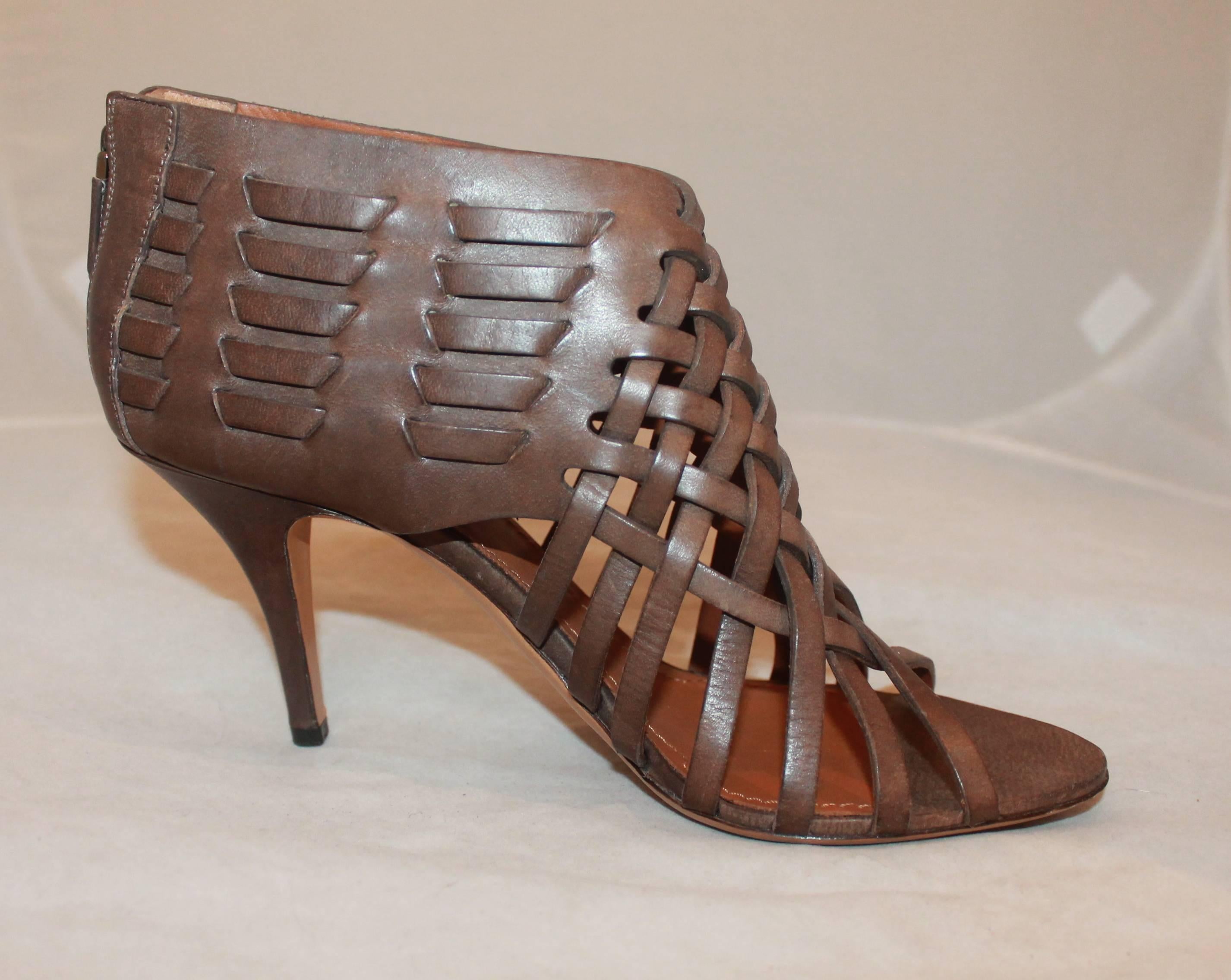 Givenchy Brown Woven Leather Sandal Bootie with Back Zipper - 40. These GIvenchy booties are fashionable and are new but have a small scuff on the heel (shown in image 5).

Measurements:
Heel- 3