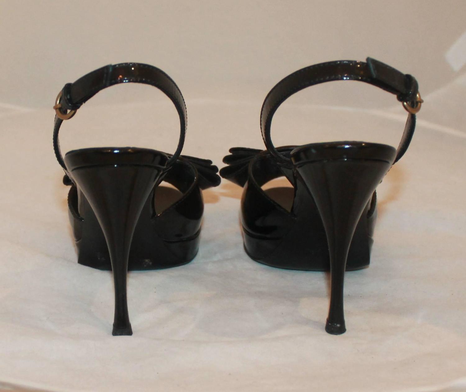 black heels with bow on front