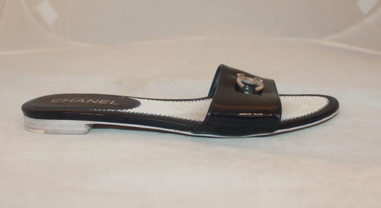 Chanel Navy Patent Slides with Silver Textured 