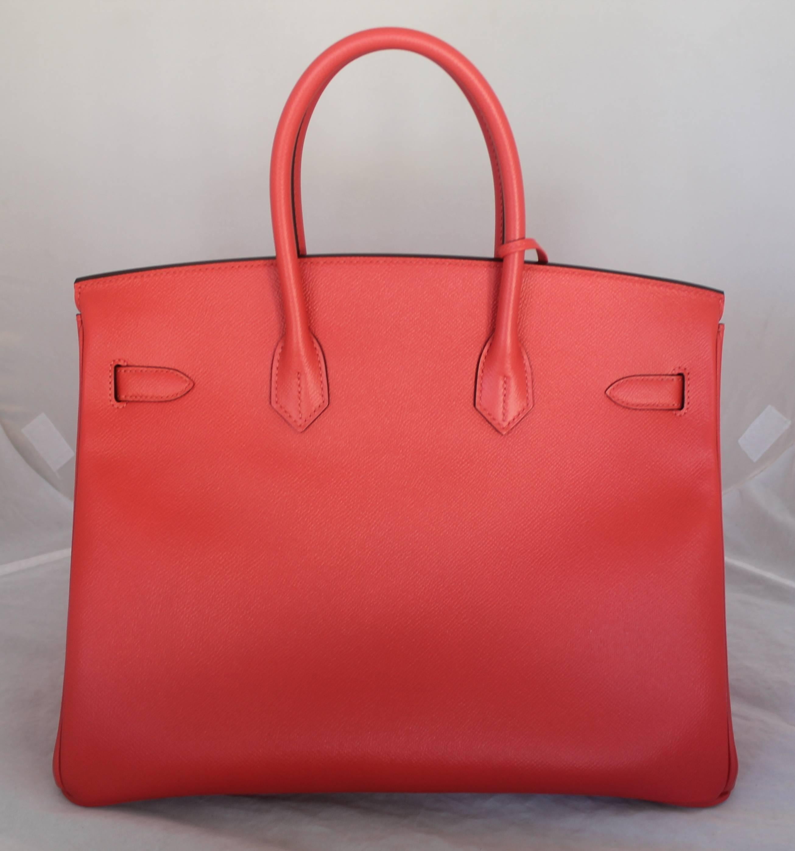Hermes New with Tags Rouge Jaipur Epsom 35 cm Birkin Bag - GHW - 2015. This beautiful bag is new and has never been worn. The tags are still hanging and there is still plastic on the hardware. The bag is the perfect pop of color for spring & summer
