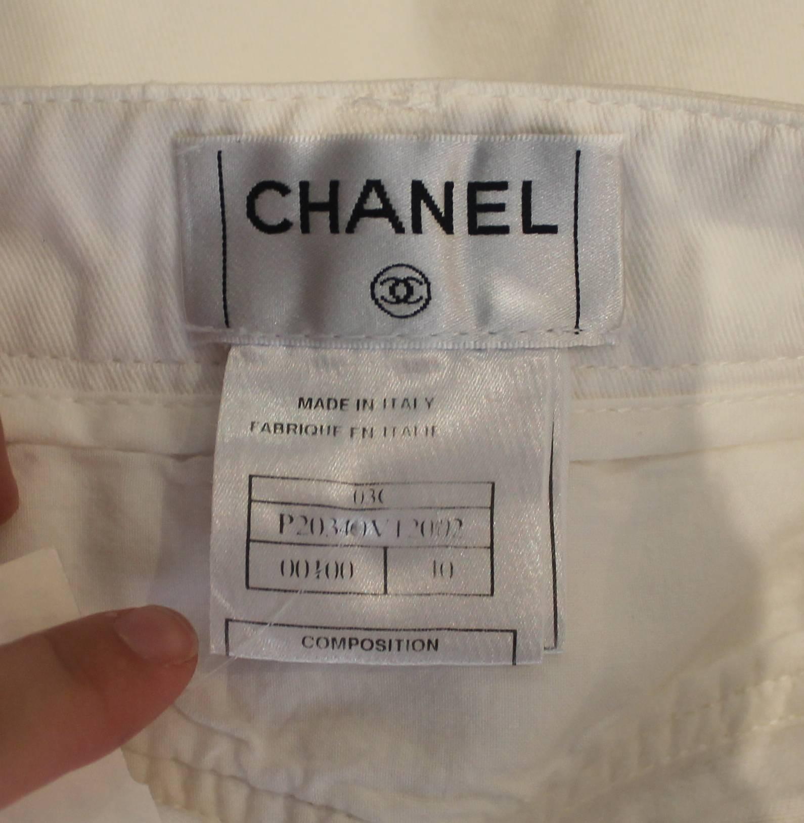 Chanel White Denim Boot Cut Jeans with Camellia Cutouts - 40 In Good Condition In West Palm Beach, FL