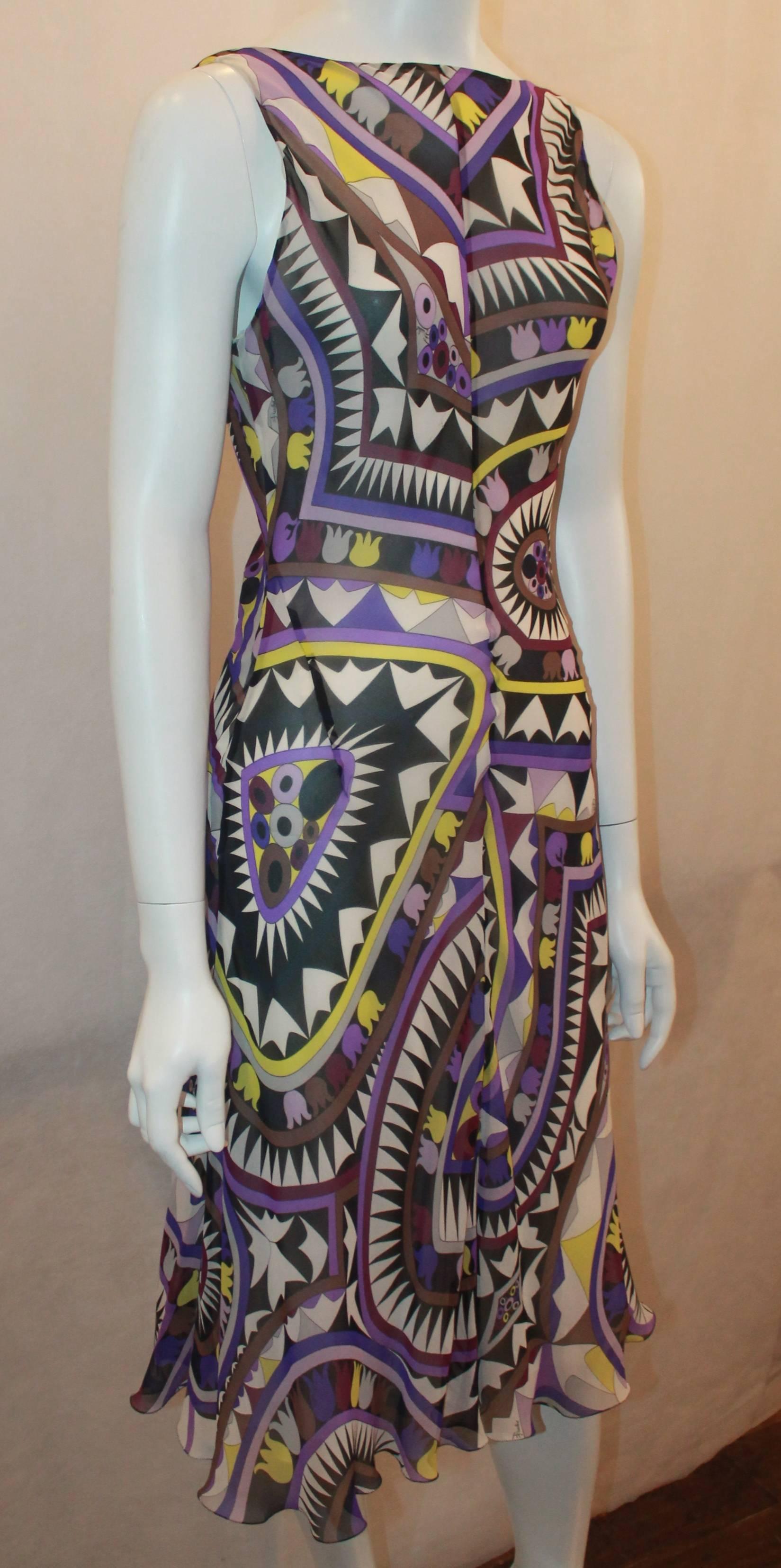 Emilio Pucci Purple & Lime Silk Chiffon Printed Sleeveless Dress - 8. This dress is in excellent condition and features a geometric print with purples, green, white, and black. It also has a low back with a tie.

Measurements:
Bust- 38