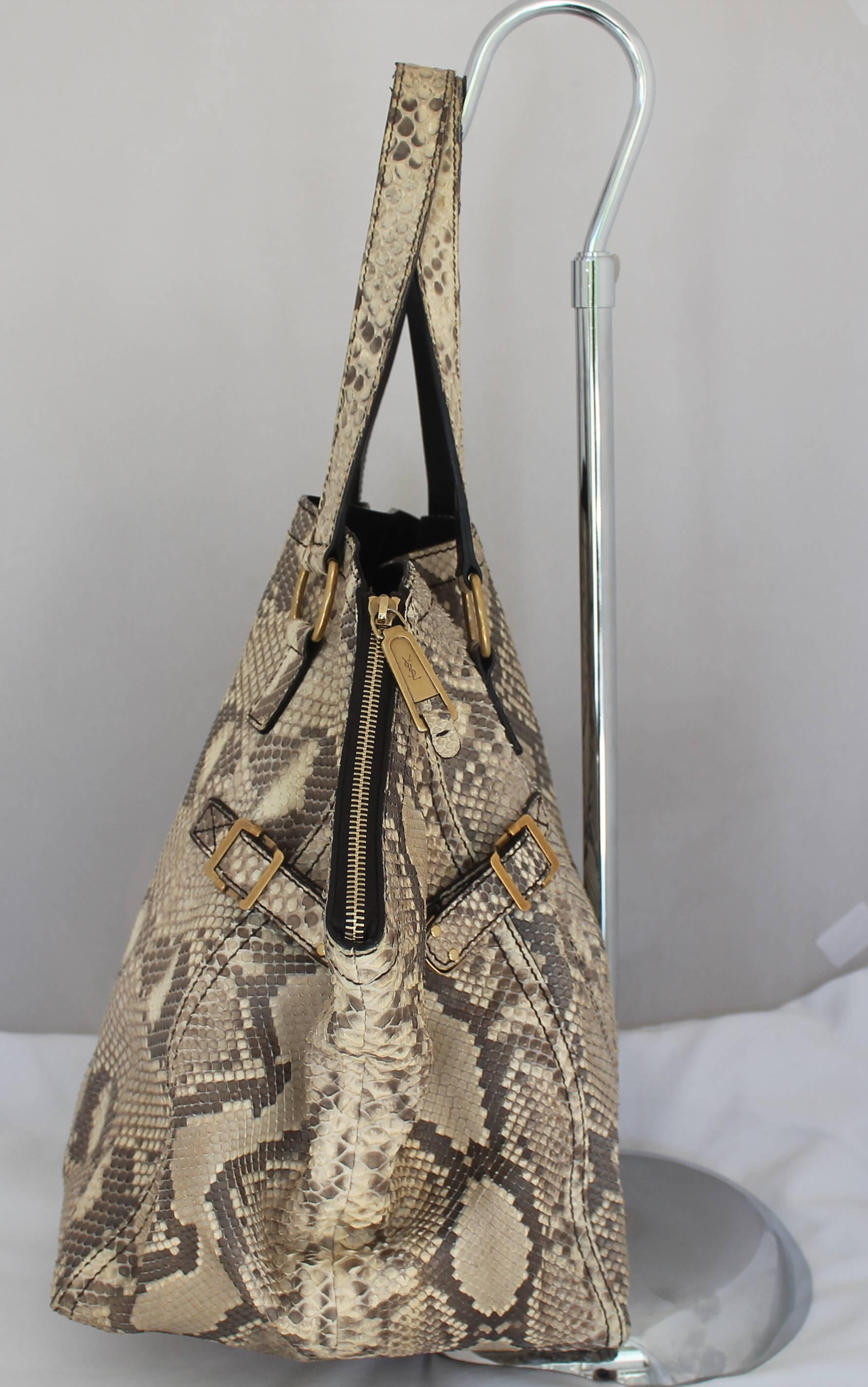 YSL Rive Gauche Earthtone Python Large Downtown Tote - GHW. This bag is in excellent condition with minor wear to the snake outside as it is very delicate. The bag features a trendy pointed top, top zippers on both flaps, 4 bottom feet, a brown