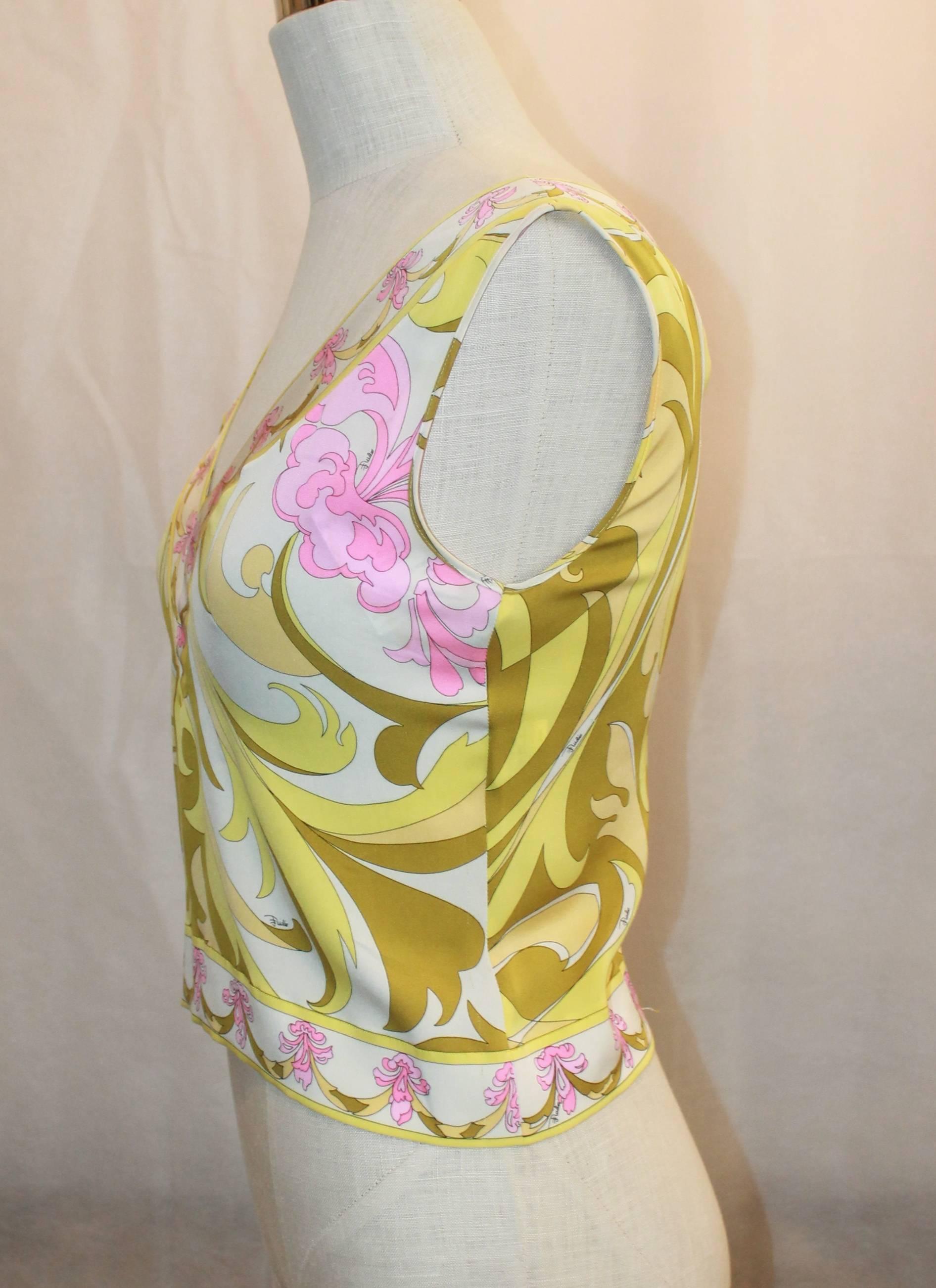 Emilio Pucci Yellow, Green & Pink Printed Sleeveless Top - 4 - 1980's This top is in excellent vintage condition with minor wear, mainly small pulls. It features a v-neck, floral printed trim, and no zipper.

Measurements:
Bust- 34
