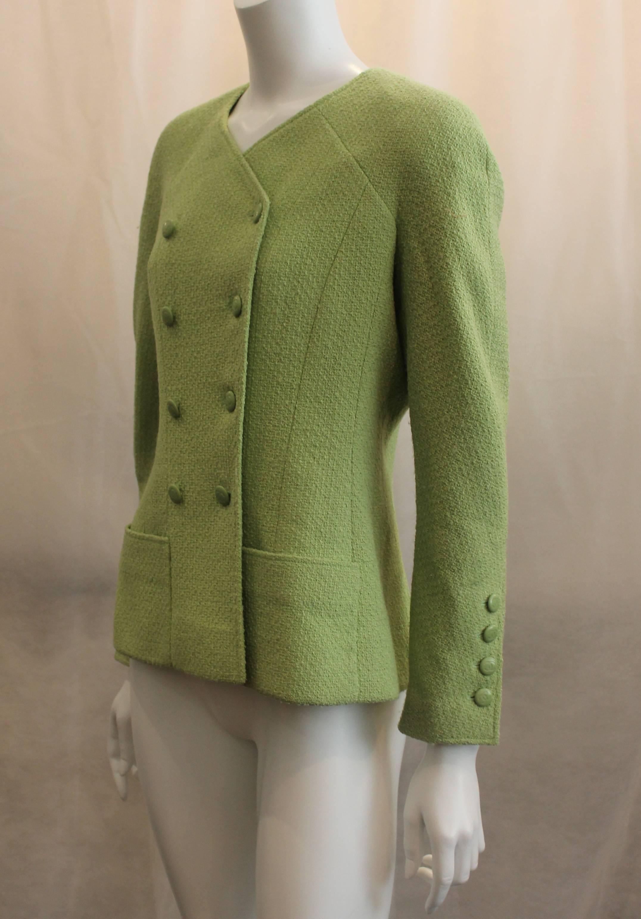 Chanel Lime Wool Double Breasted Jacket - Sz 38-Circa 96A  This beautiful double breasted classic piece has logo enamel buttons, 2 front lower pockets, 4 functional button holes on sleeve. This jacket is in very good condition.