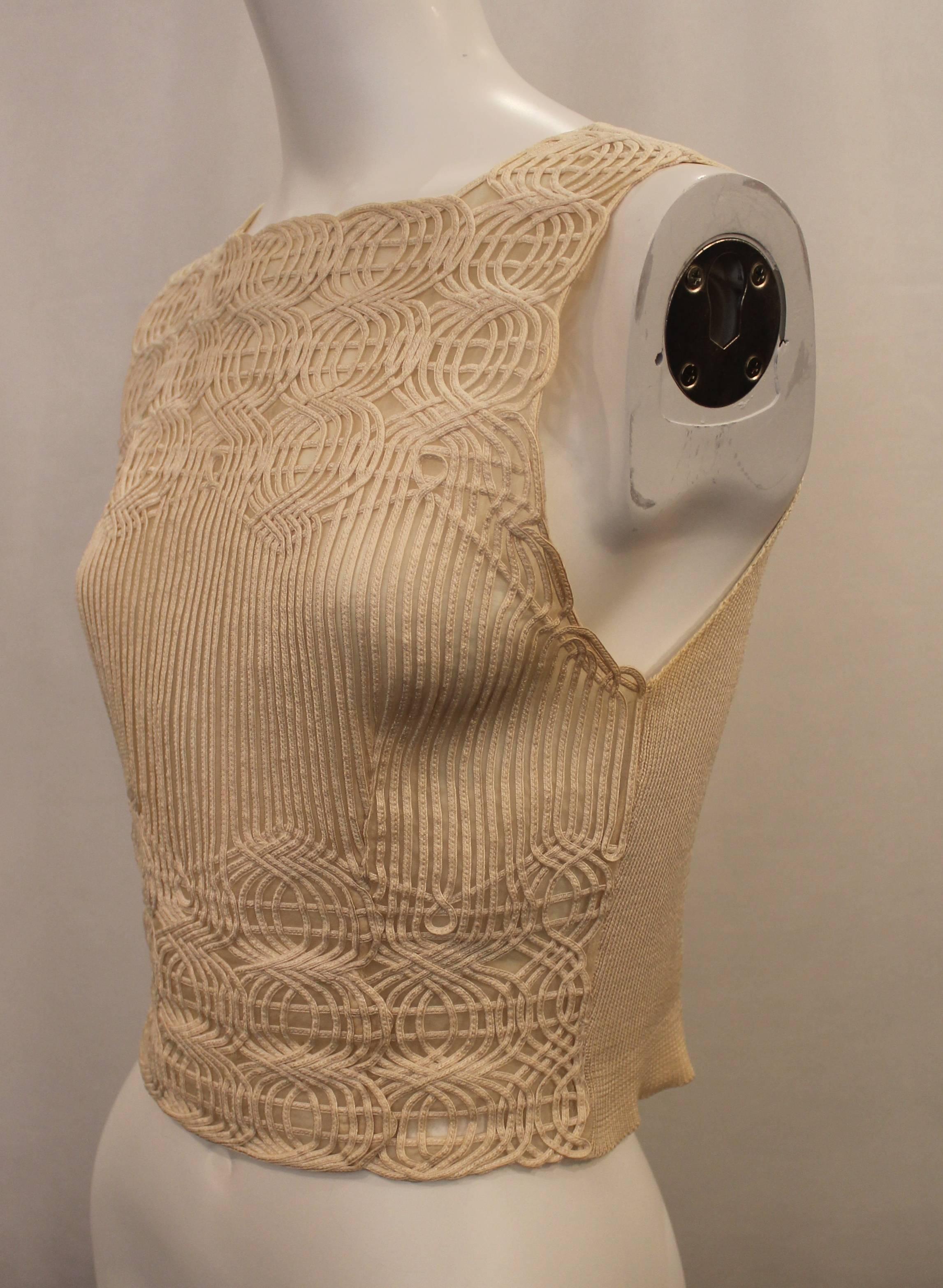 Valentino Ivory Lace Soutache Sleeveless Cropped Top - S - 1990's. This top is in good vintage condition with general wear and some discoloration near the armpit. It features a lace soutache design in the front with a knit-like