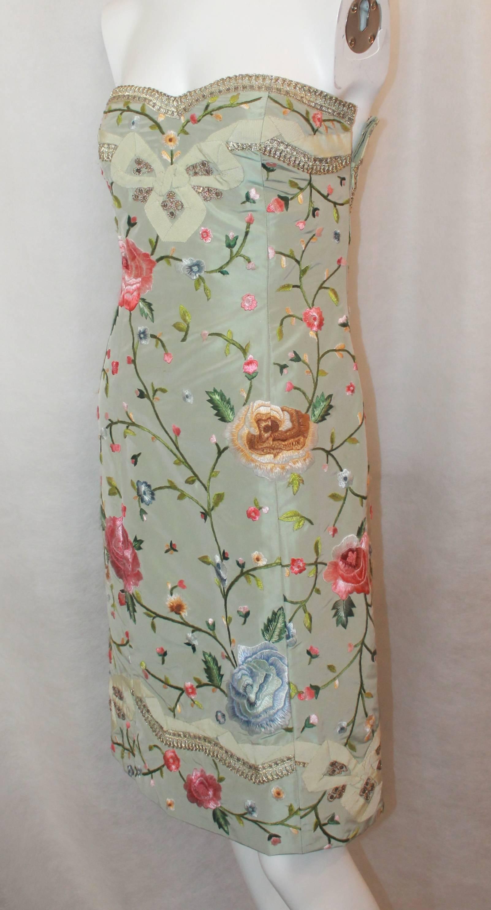 Oscar de la Renta Pastel Green Silk Taffeta Floral Strapless Dress - 4. This dress is in very good condition with the only issue being that the floral embroidery is pilling and there is one very small spot on the back (shown in the images). The
