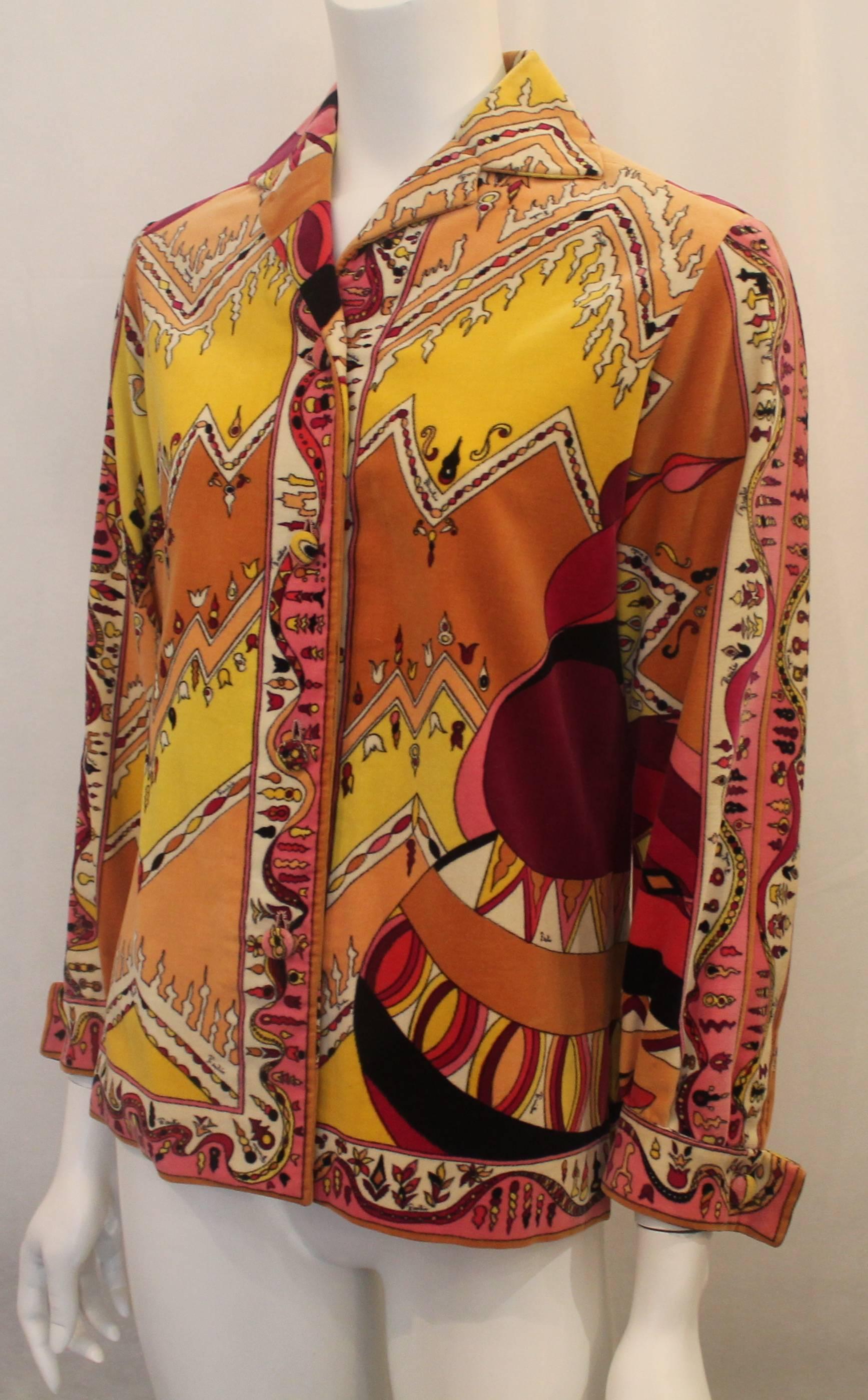 Vintage Pucci Multi Colored Velvet Cotton Shirt Jacket  - 4 - circa 1970's. This vintage Pucci shirt jacket is many colors such as pink, yellow, black, peach, cream and purple. It has front buttons and comes with three extra buttons. The sleeves are