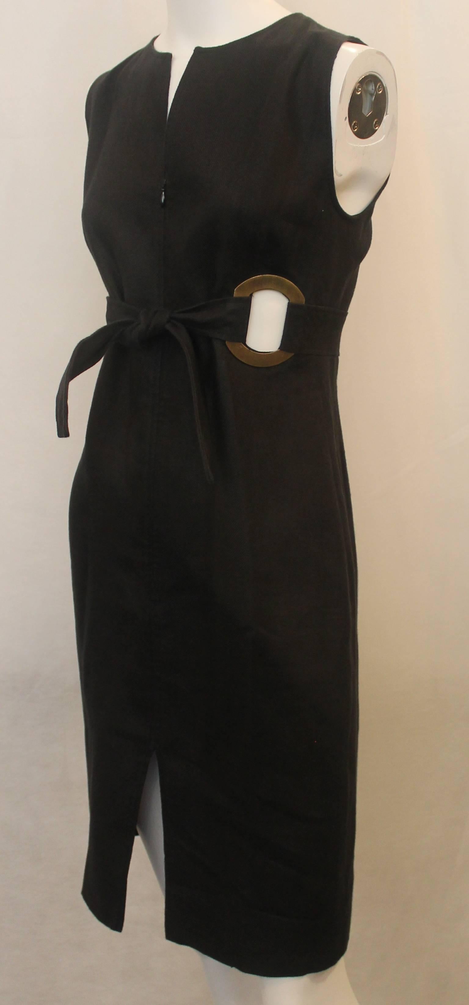 Valentino Black Linen Sleeveless Dress with Grommet Belt - 6. This dress is in very good condition with light wear to the fabric and discoloration to the gold grommets. It also has a front zipper which zips down to the hips and a slit by the